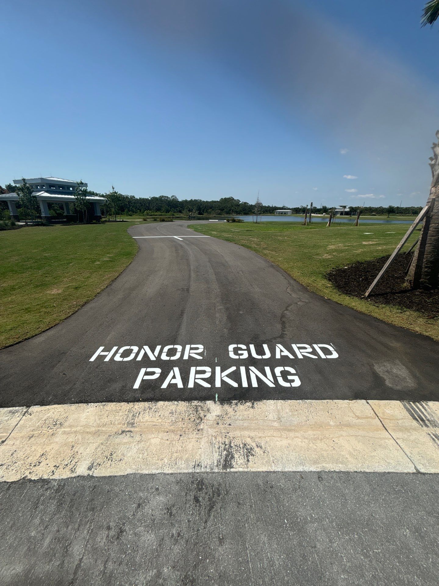 Line striping at Sarasota National Cemetery by Everline Coatings & Services - Southwest FL
