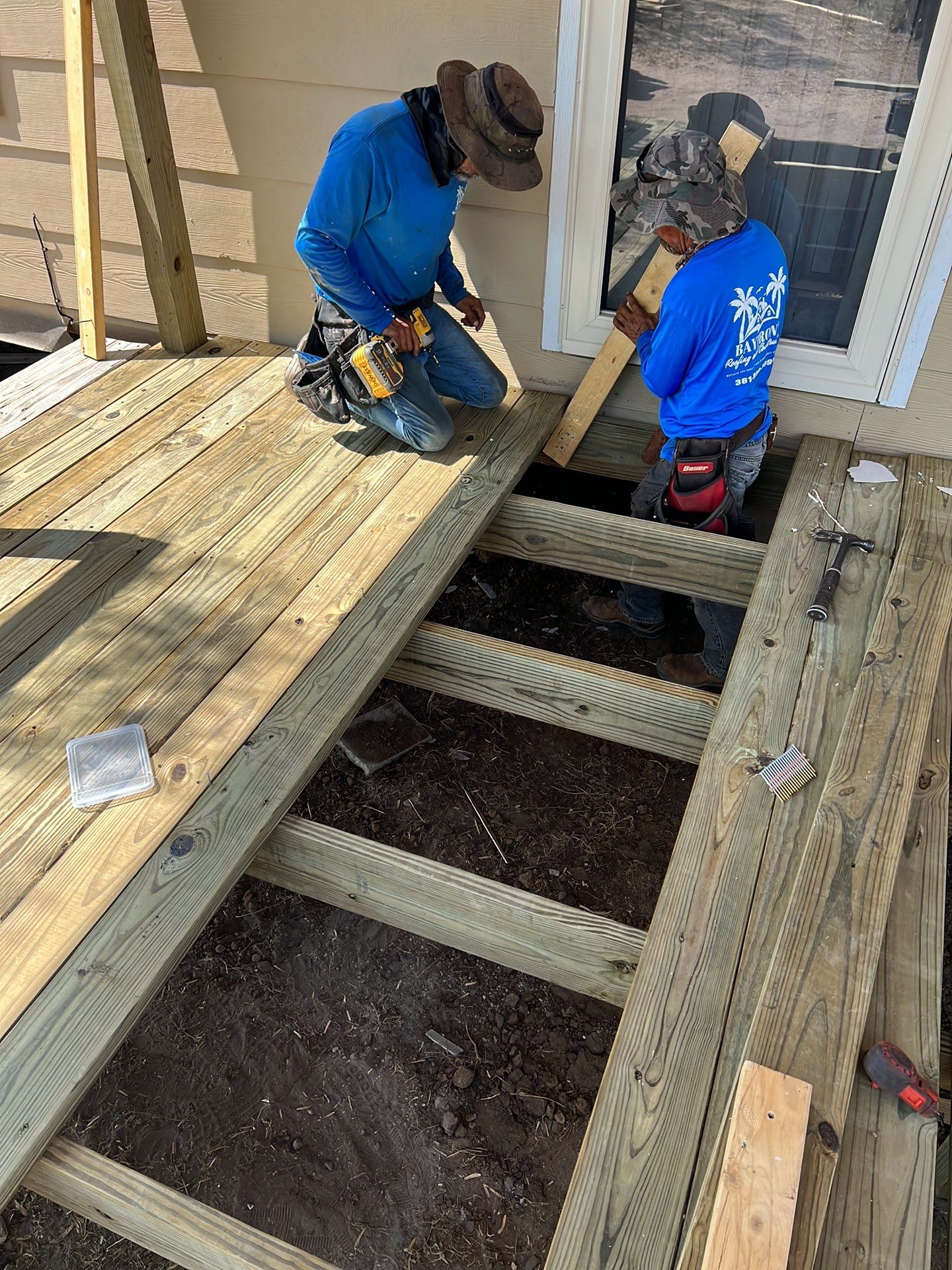 Front Porch Sitt'n by Bayfront Roofing and Construction
