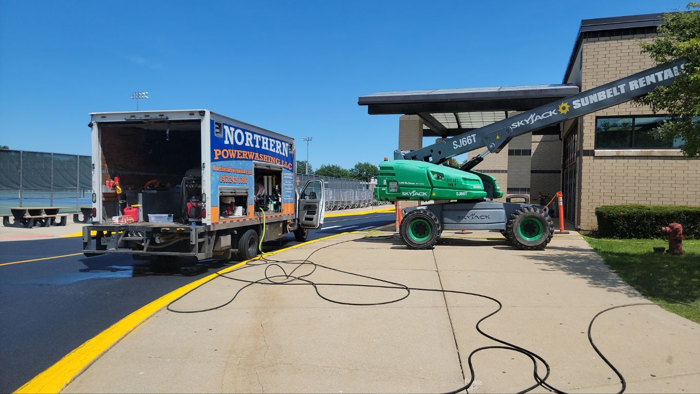 commercial pressure washing using Algaecide, soft wash soap by Northern Power Washing LLC.