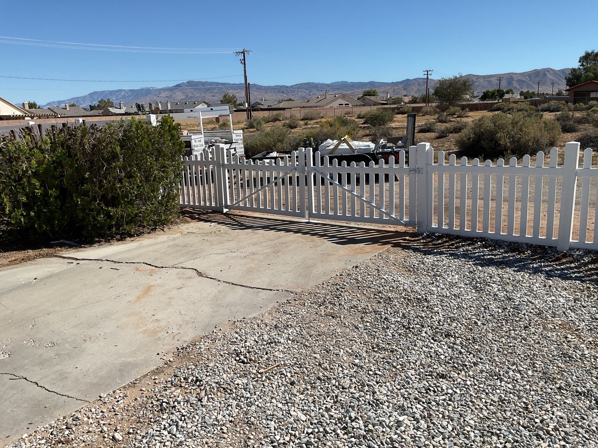White picket fence  by Fence Guys Inc. 