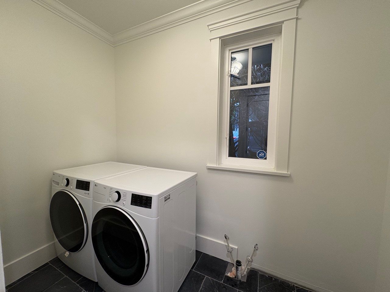 High-End Laundry Room Renovation and Restoration in Vancouver by YVR Construction Group