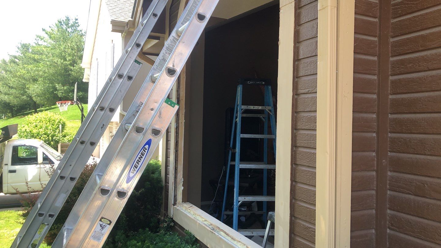 Siding Installation using Heartland Patio Door by EEC  Windows, Siding & Roofing 