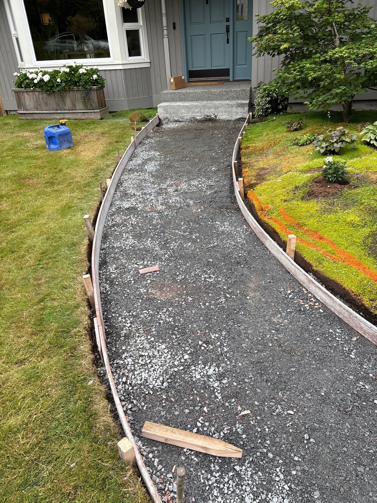 Exposed Aggregate Concrete Driveway Makeover  by Jireh Asphalt & Concrete Inc 