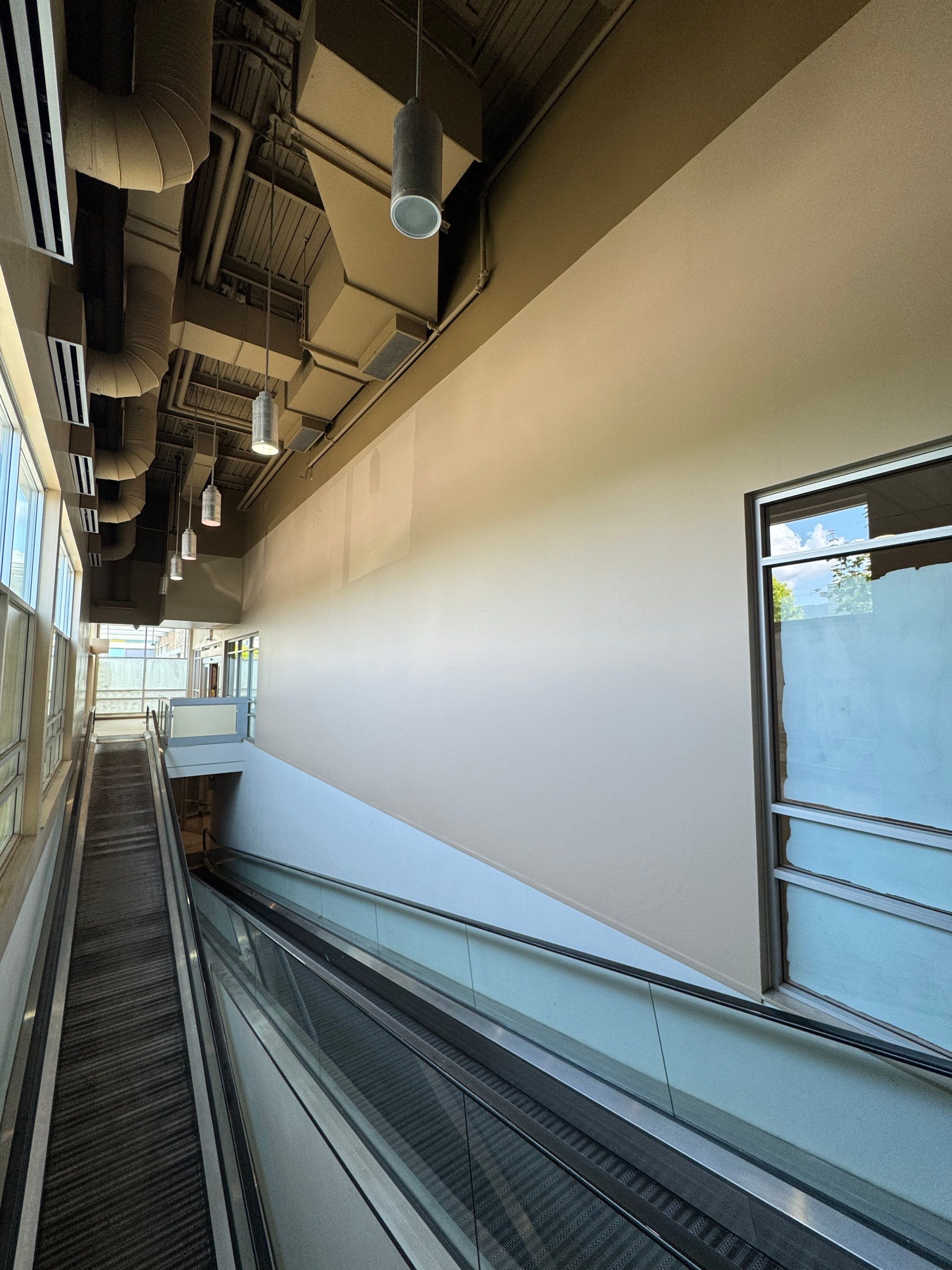 Commercial Prime & Paint Project-30ft height by YVR Construction Group