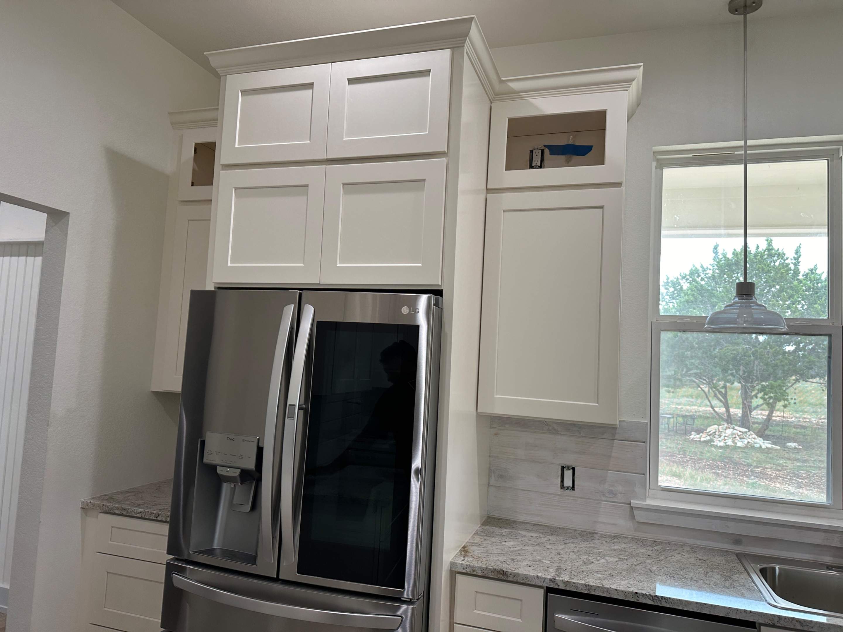 Antique shaker cabinets and granite kitchen and bathroom installation by Mena stone surfaces