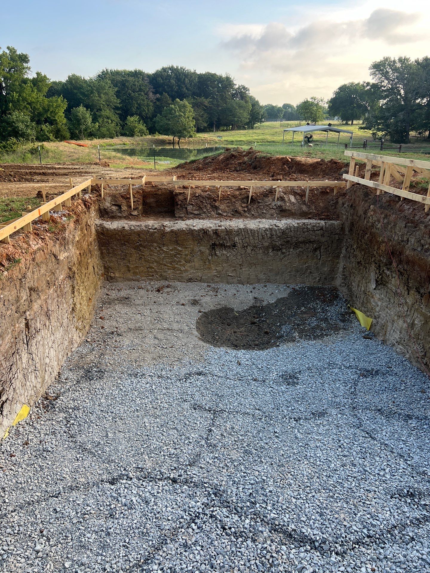 Sleek Rectangular Pool with Dark Interior Finish by Pinnacle Pools and Spas - DFW