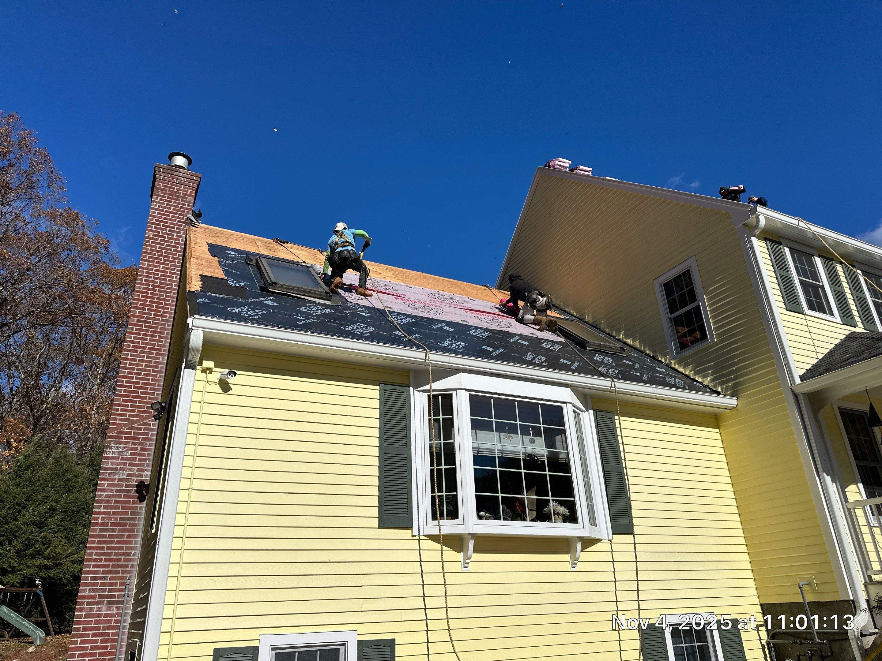 Chelmsford Premium Roof: Onyx Black Shingles with Standing Seam Metal Porch by Mighty Dog Roofing of Greater Middlesex County