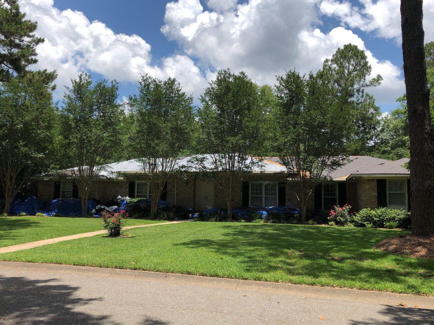Residential Roofing Installation using Roof Replacement by American Roofing & Construction LLC