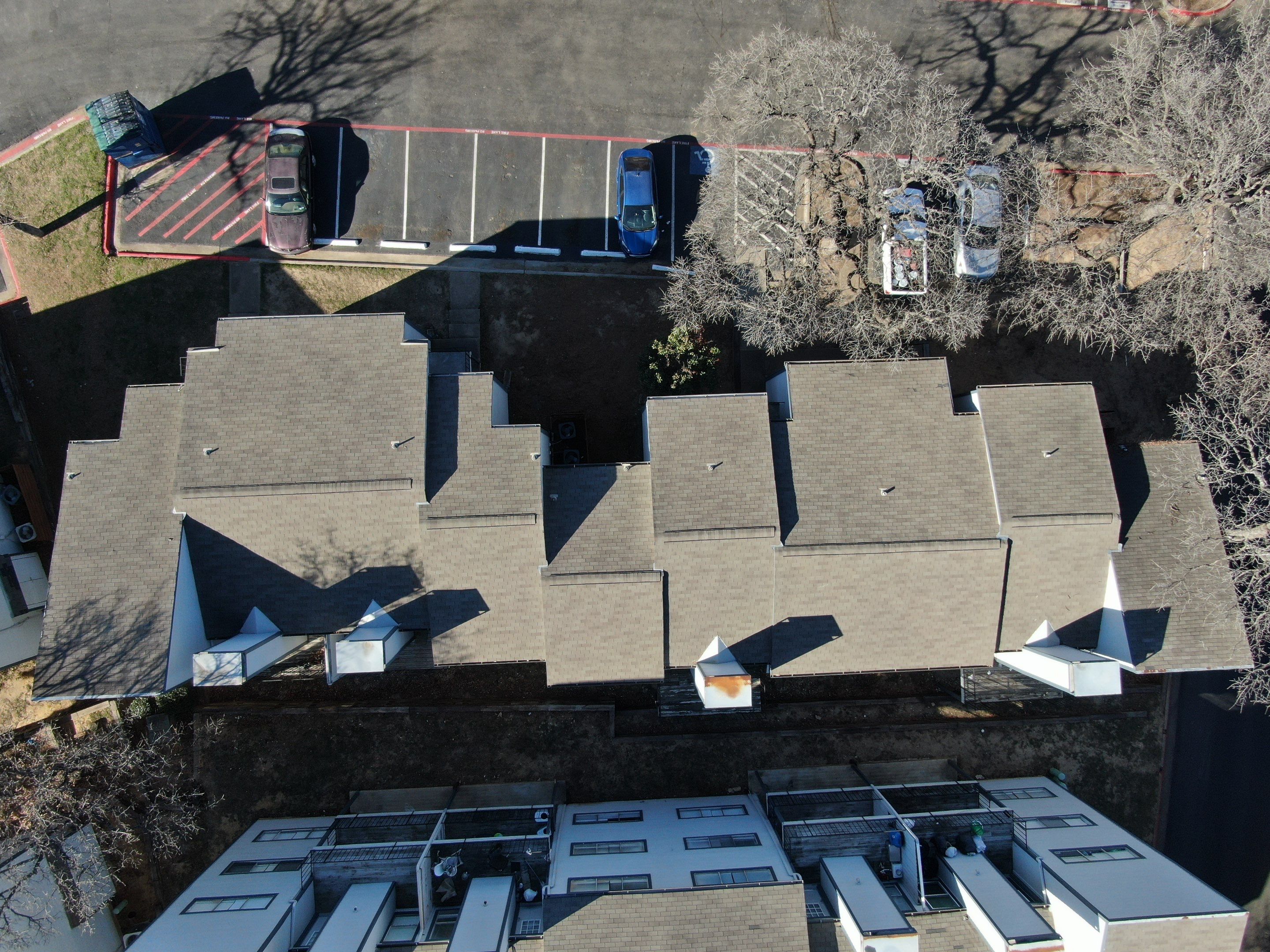 Apartment Roofing Repairs using Certainteed xt25 by Becker Roofing and Exteriors