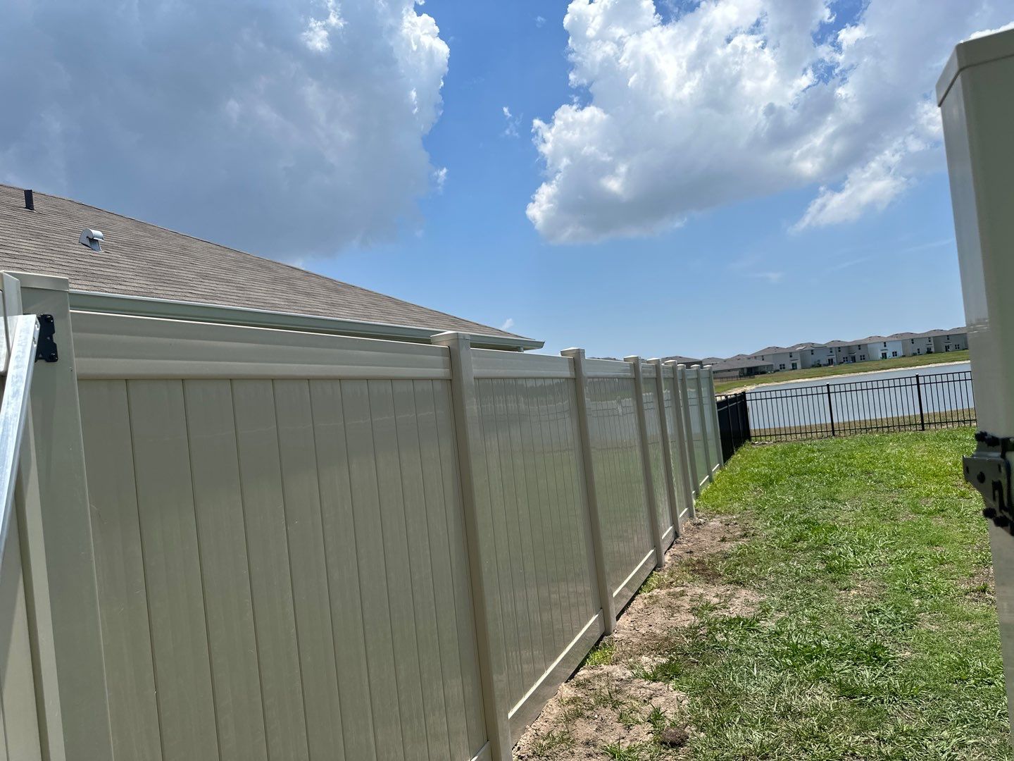 Aluminum Fence Installation using Black 3 Rail Aluminum Fence and Tan Vinyl Privacy Fence by Asap fence and gates, LLC