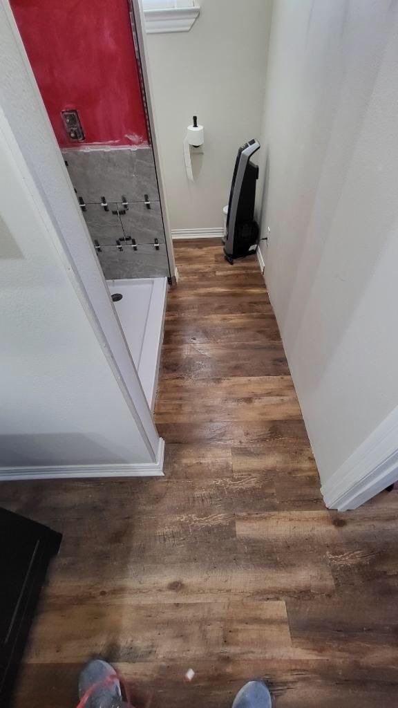 Bathroom Remodel using Tile  by SLM General Contractors & Roofing