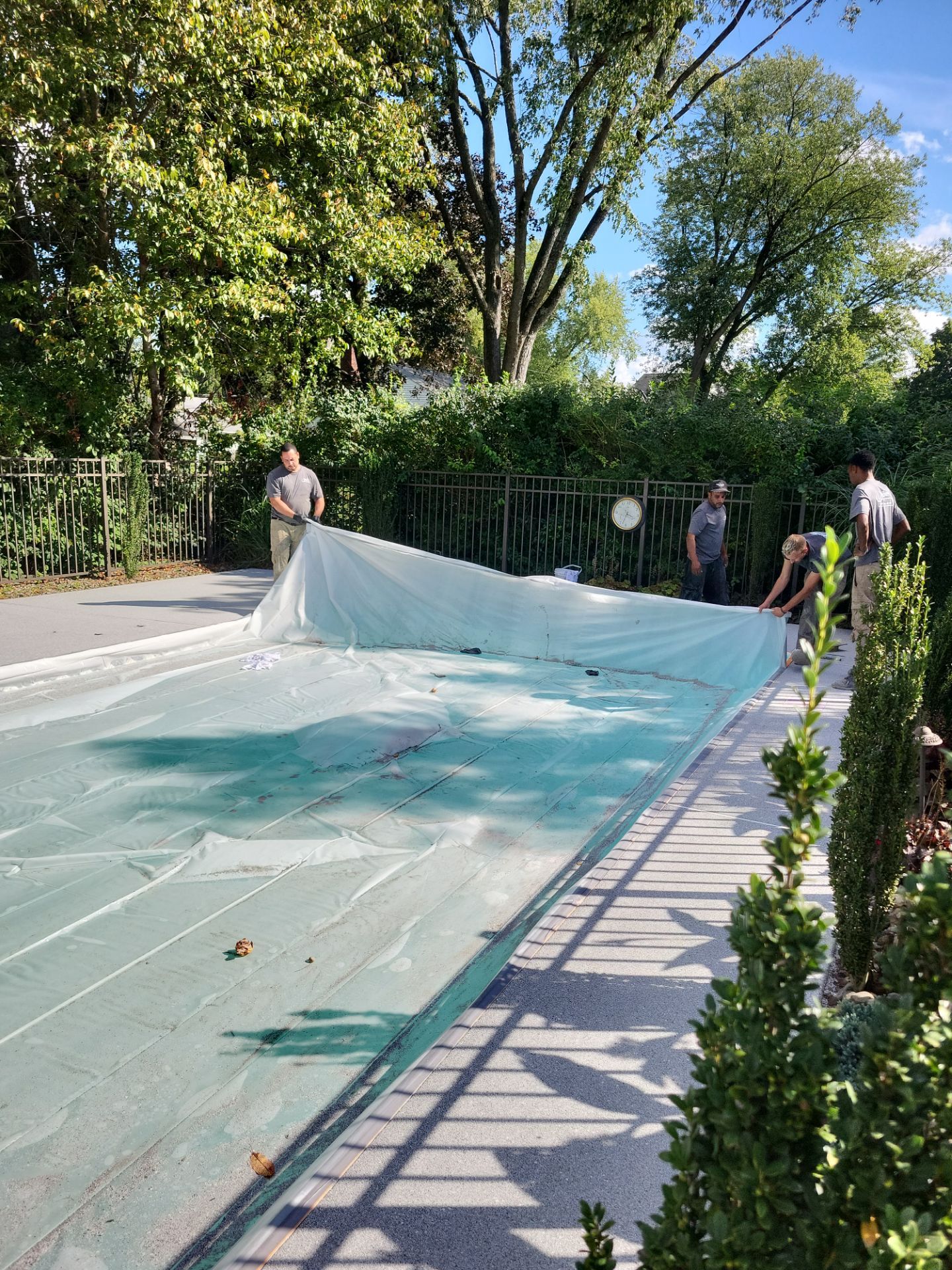 Blue Granite Pool Patio Concrete Coating in Lincoln Park by Spectrum Painting, LLC