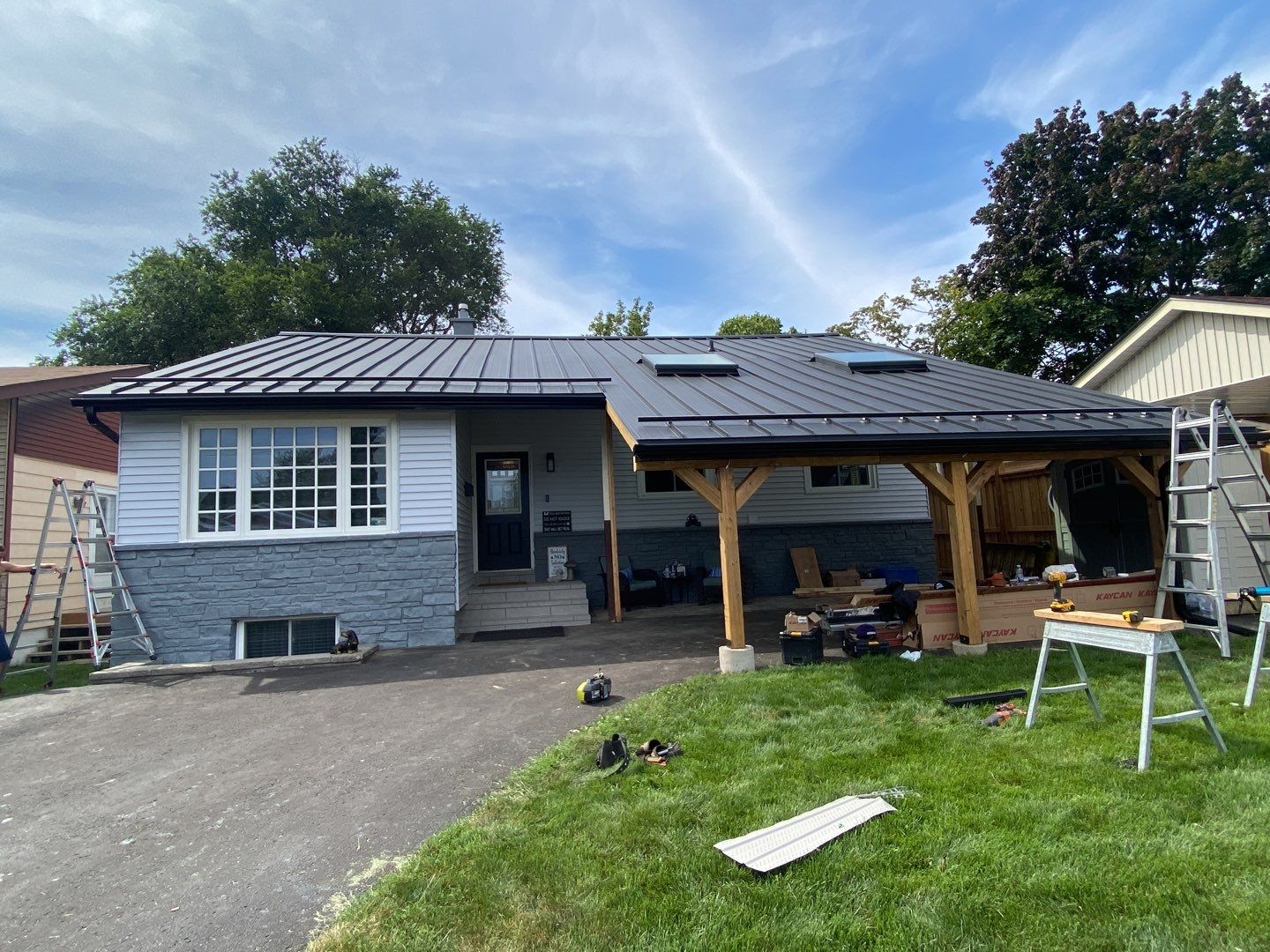 Residential Roofing Installation using 16" Standing Seam Panels by Jay Carter Roofing & Sheet Metal