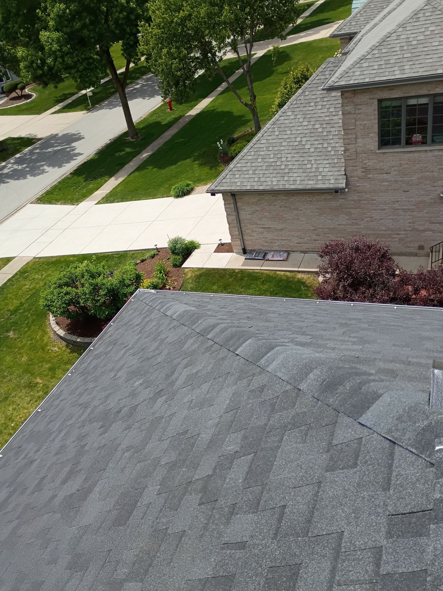 Asphalt Shingle Roof Replacement and Skylight Installation in Darien by Pro Home Services Inc