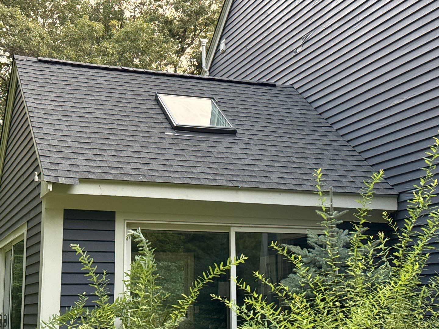 Solar-Ready Roof Replacement with GAF Pewter Gray Shingles & VELUX Skylights by Sensible Home Solutions