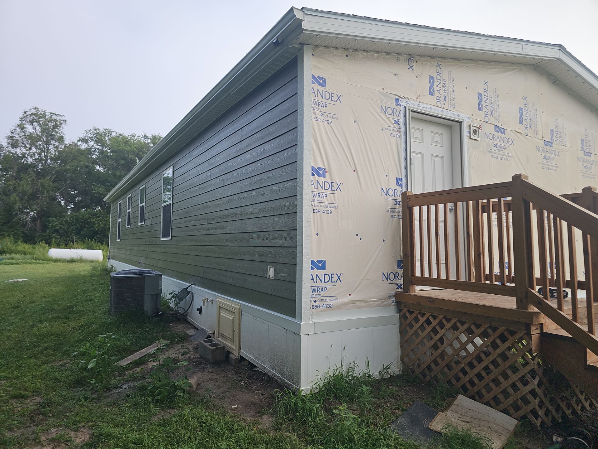 Riverdale Exterior Transformation | TAMKO Roofing & James Hardie Siding by Loyal Nine