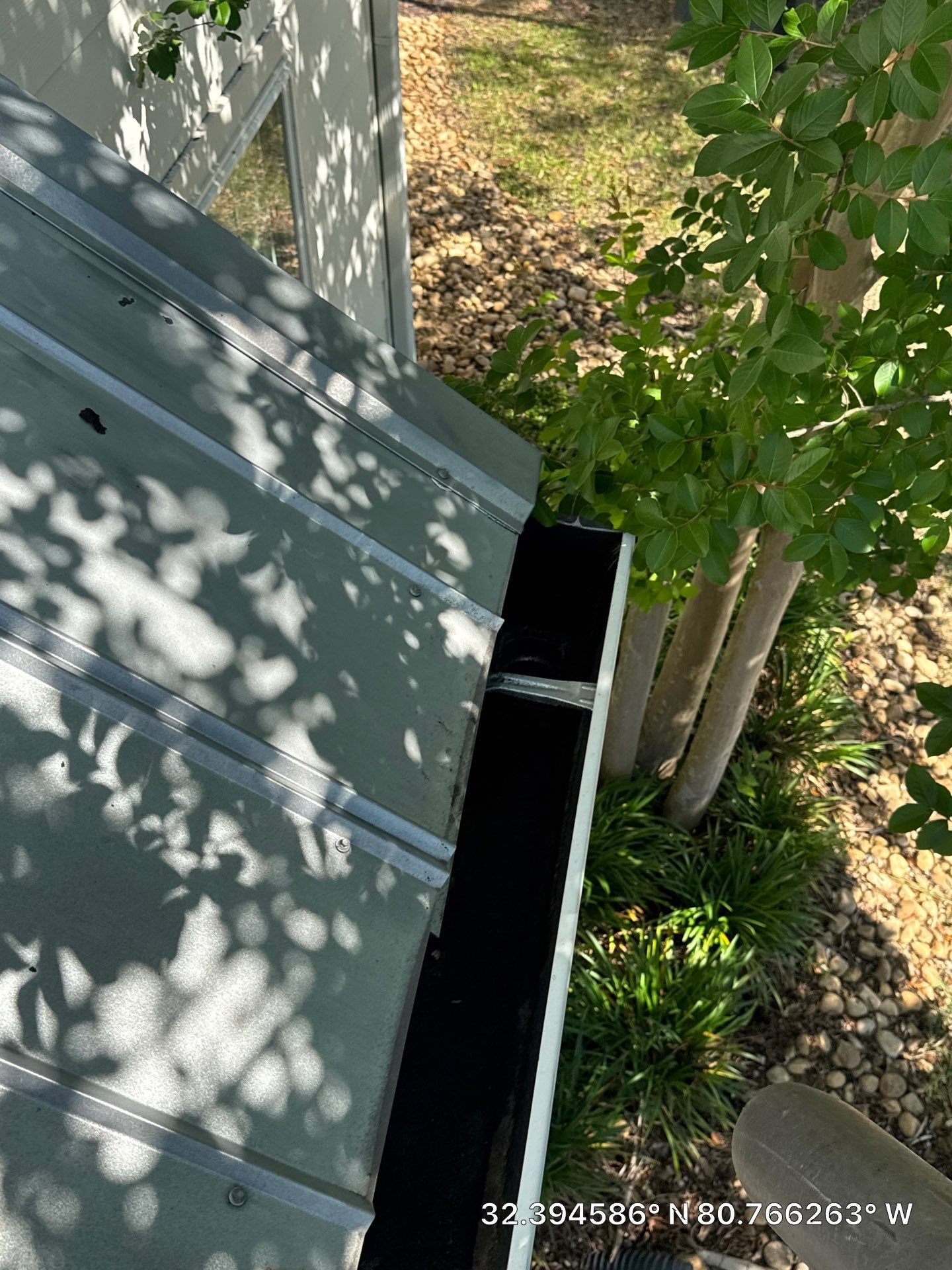 HOA gutter cleaning in Hilton Head & Bluffton, SC after  photo showing full gutters.