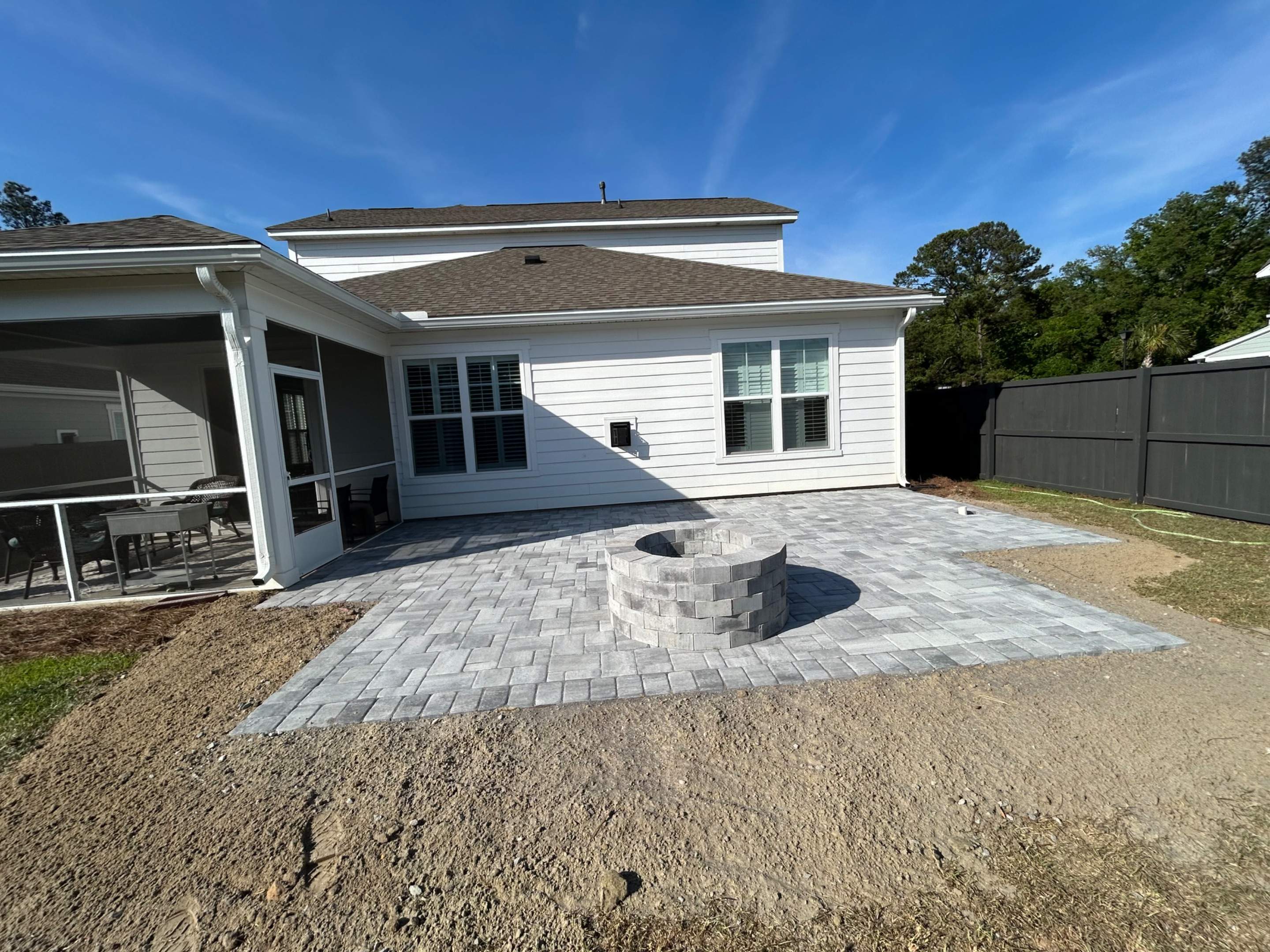 Custom Paver Patio and Stone Fire Pit Installation in Mt Pleasant by Lowcountry Scapes, LLC