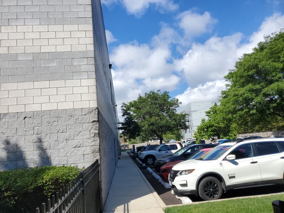 commercial pressure washing using Algaecide, soft wash soap by Northern Power Washing LLC.