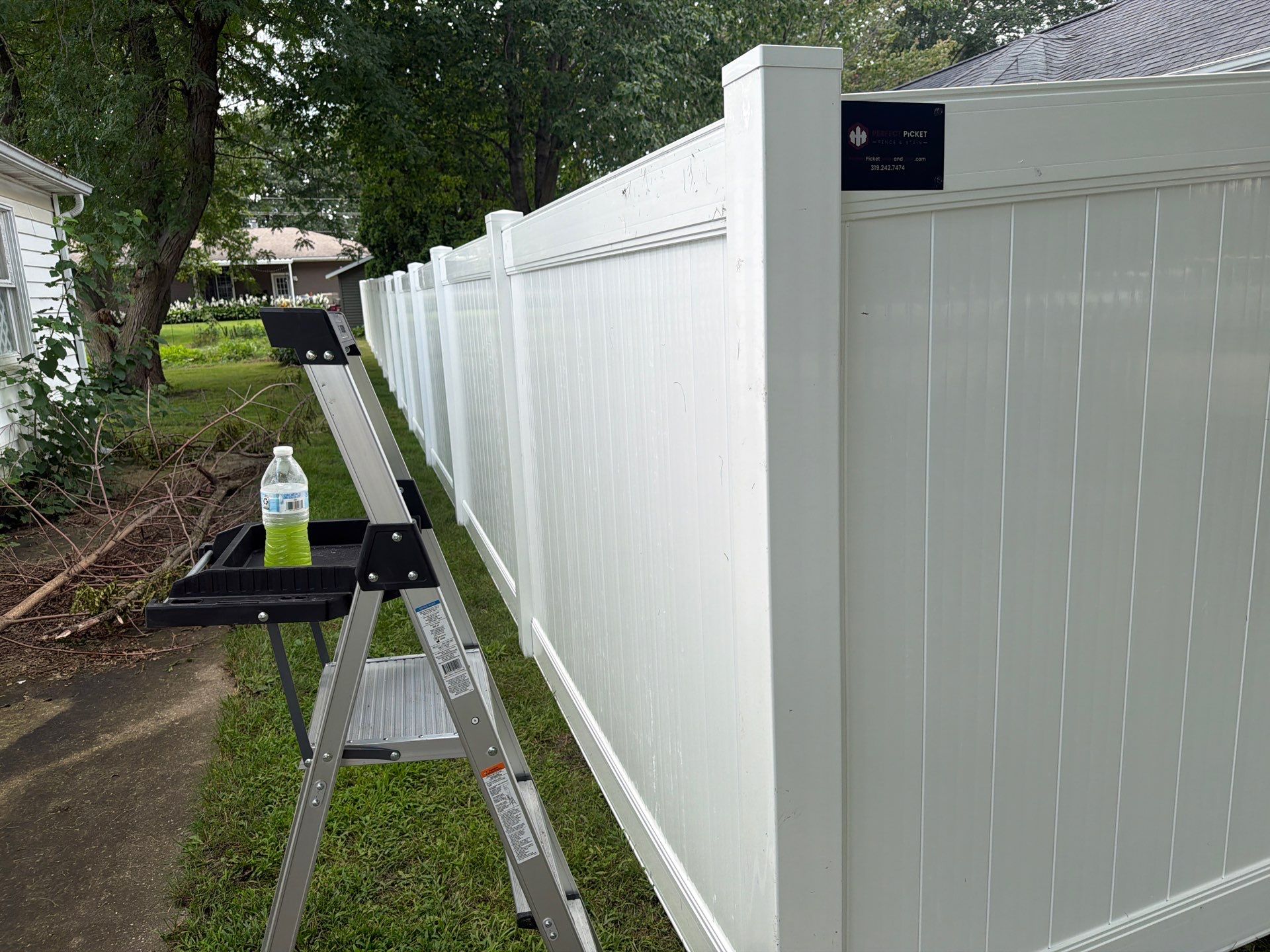 Residential White Vinyl Privacy and Black Chain Link Fencing in Jesup by Perfect Picket Fence and Stain