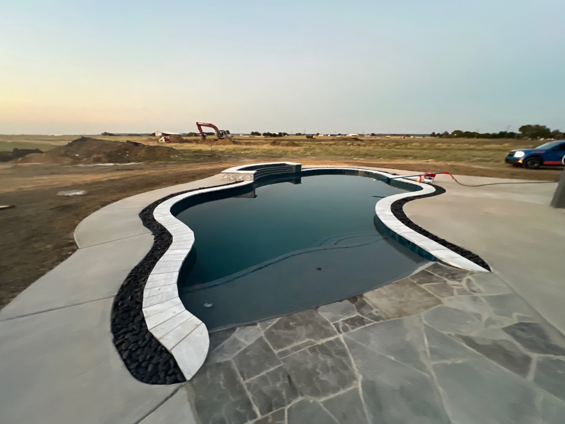 Large Freeform Pool with Beach Entry by Pinnacle Pools and Spas - DFW