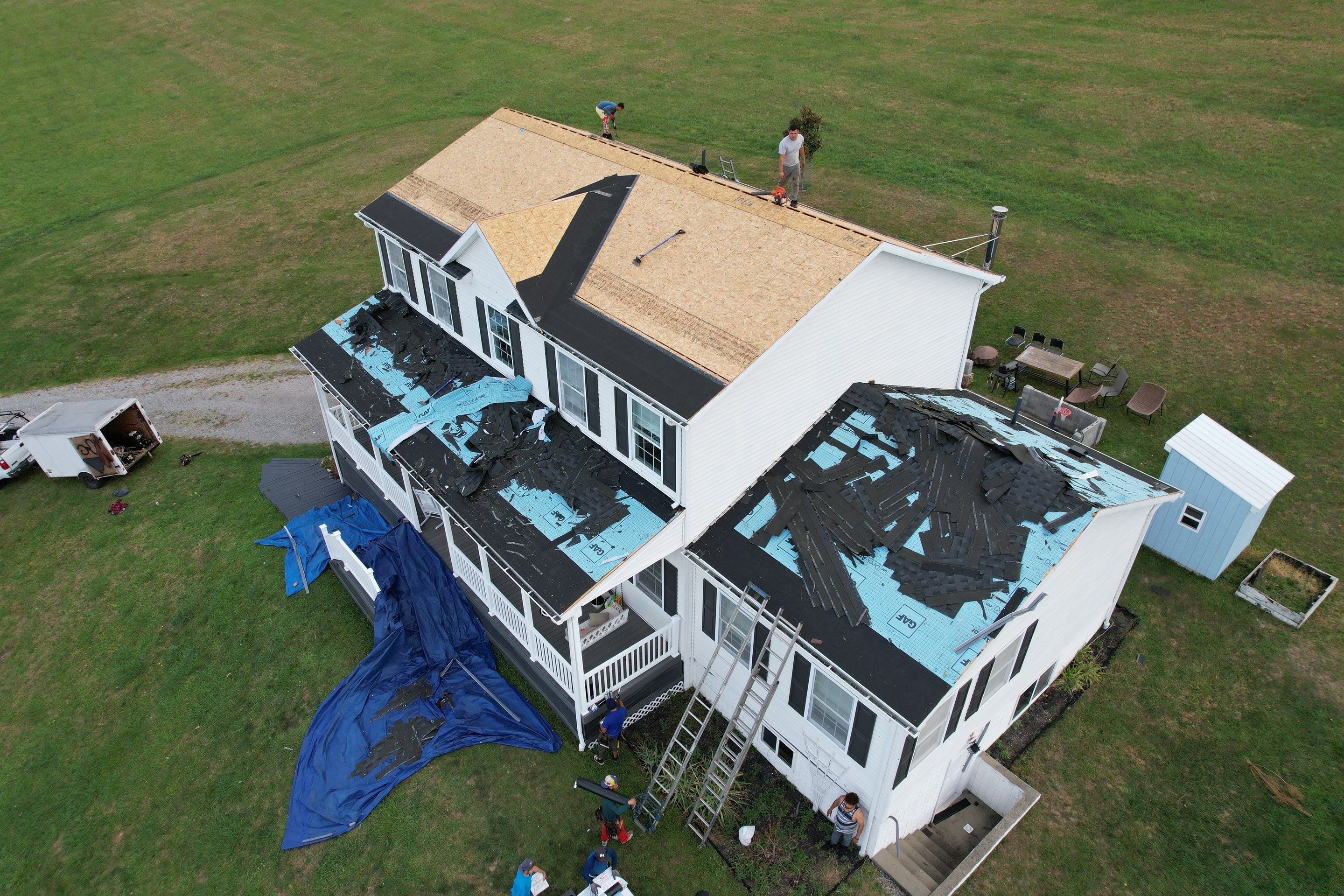 Residential Roofing Installation using GAF Timberline HDZ Charcoal by Rainstoppers Roofing