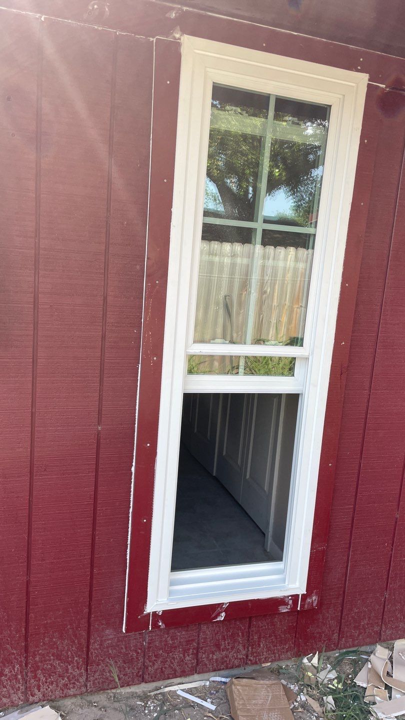 Black and white and red all over by Bayfront Roofing and Construction