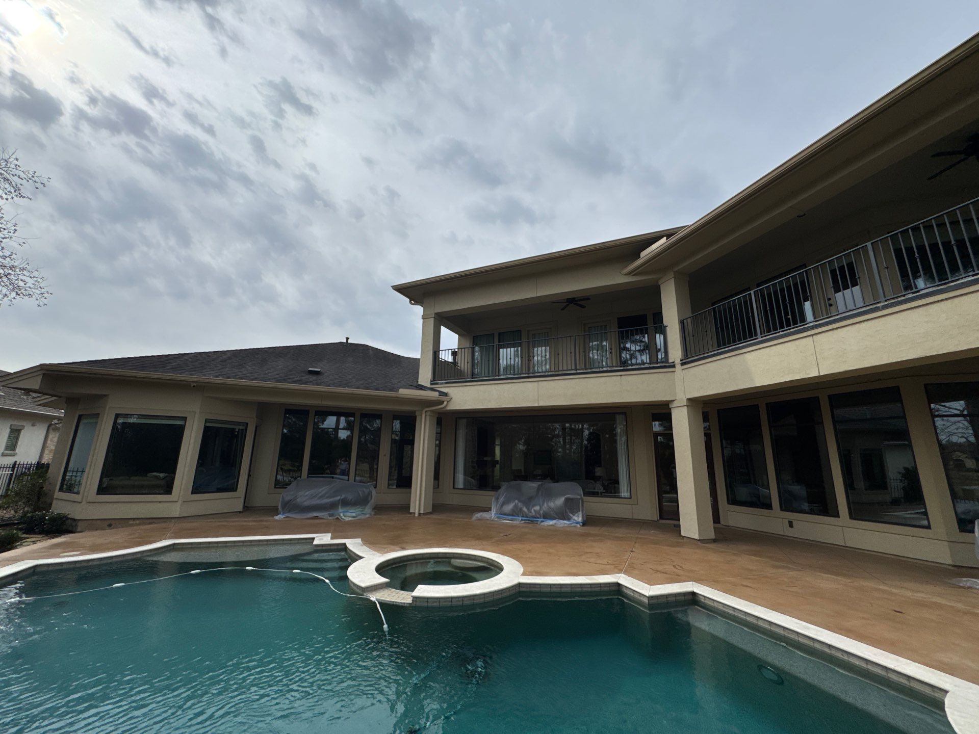 Complete Exterior Painting and Stucco Refinishing in Spring by Rolling Nations