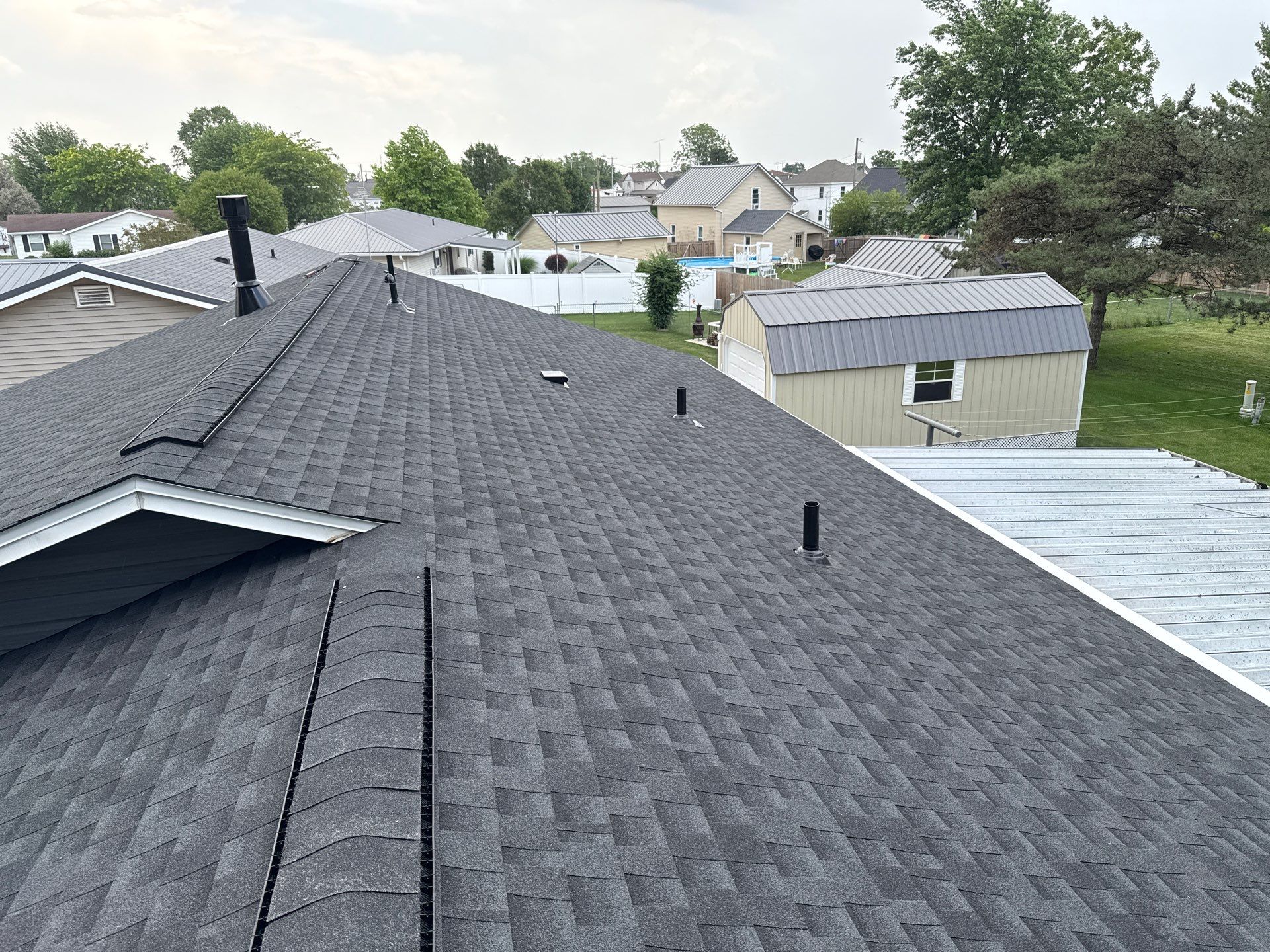 Residential Roofing Installation using GAF Timberline HDZ Charcoal by Nitro Roofing and Construction