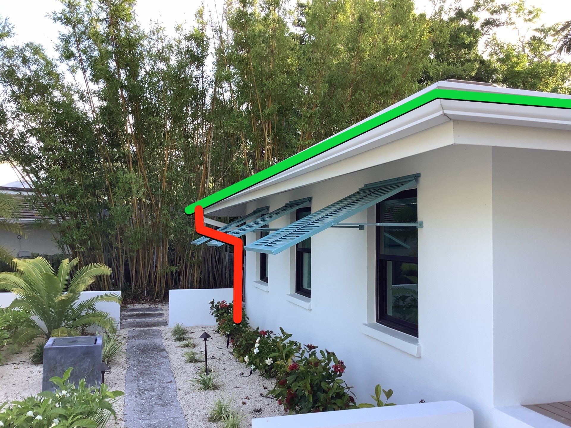 White Seamless Gutters and Downspouts in Sarasota FL by Gutter Professors