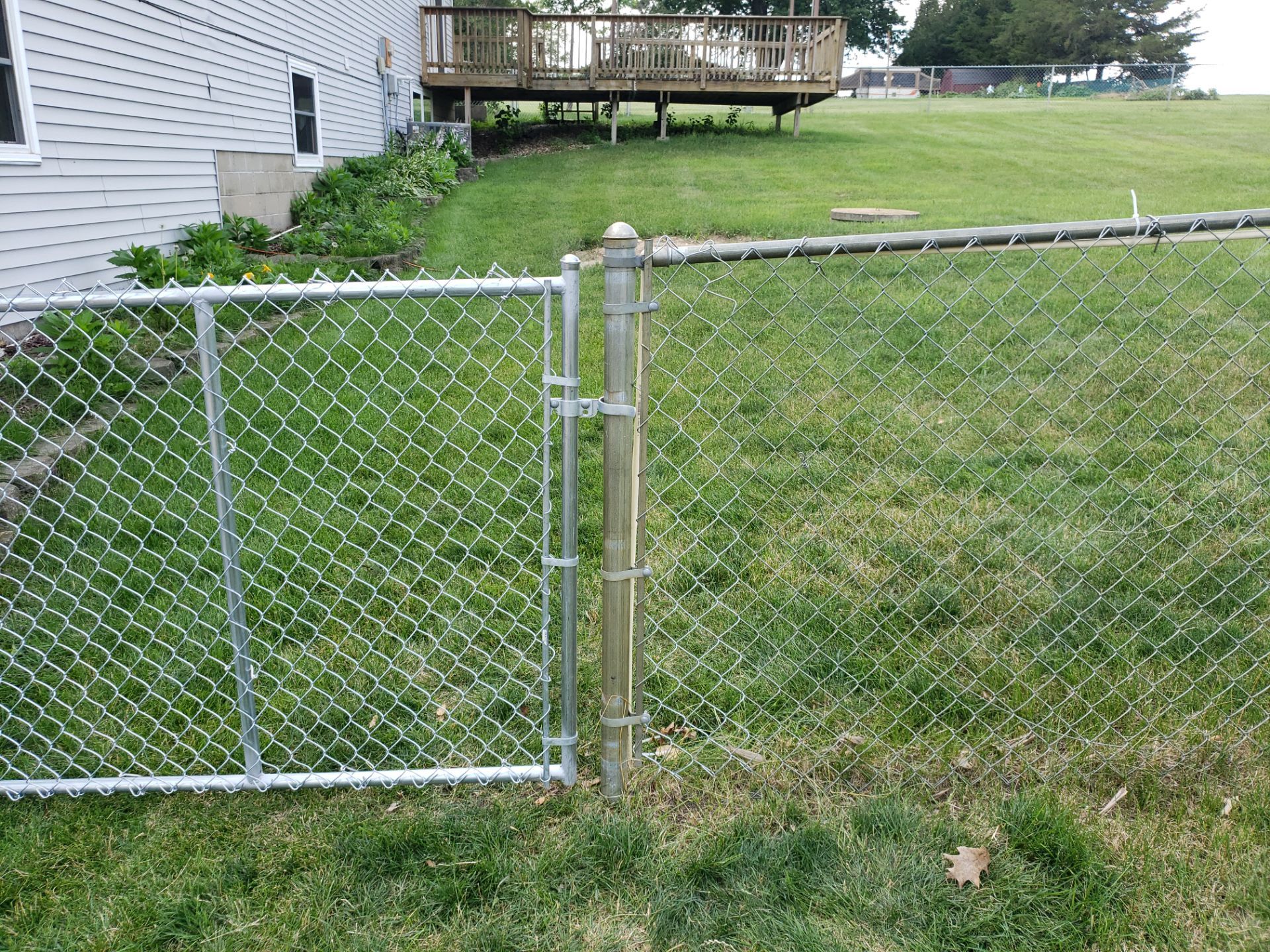 Hudson Residential Chain Link Fence and Pedestrian Gate Installation by Perfect Picket Fence and Stain