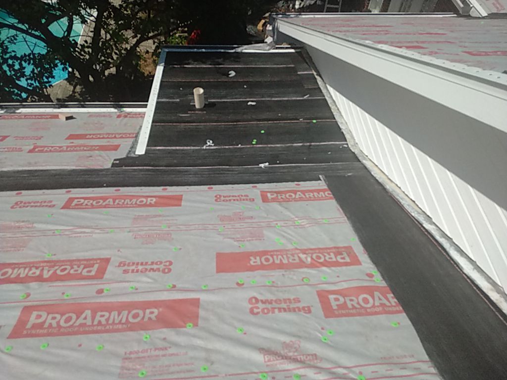 Residential Roofing Installation using Roof Replacement by American Roofing & Construction LLC