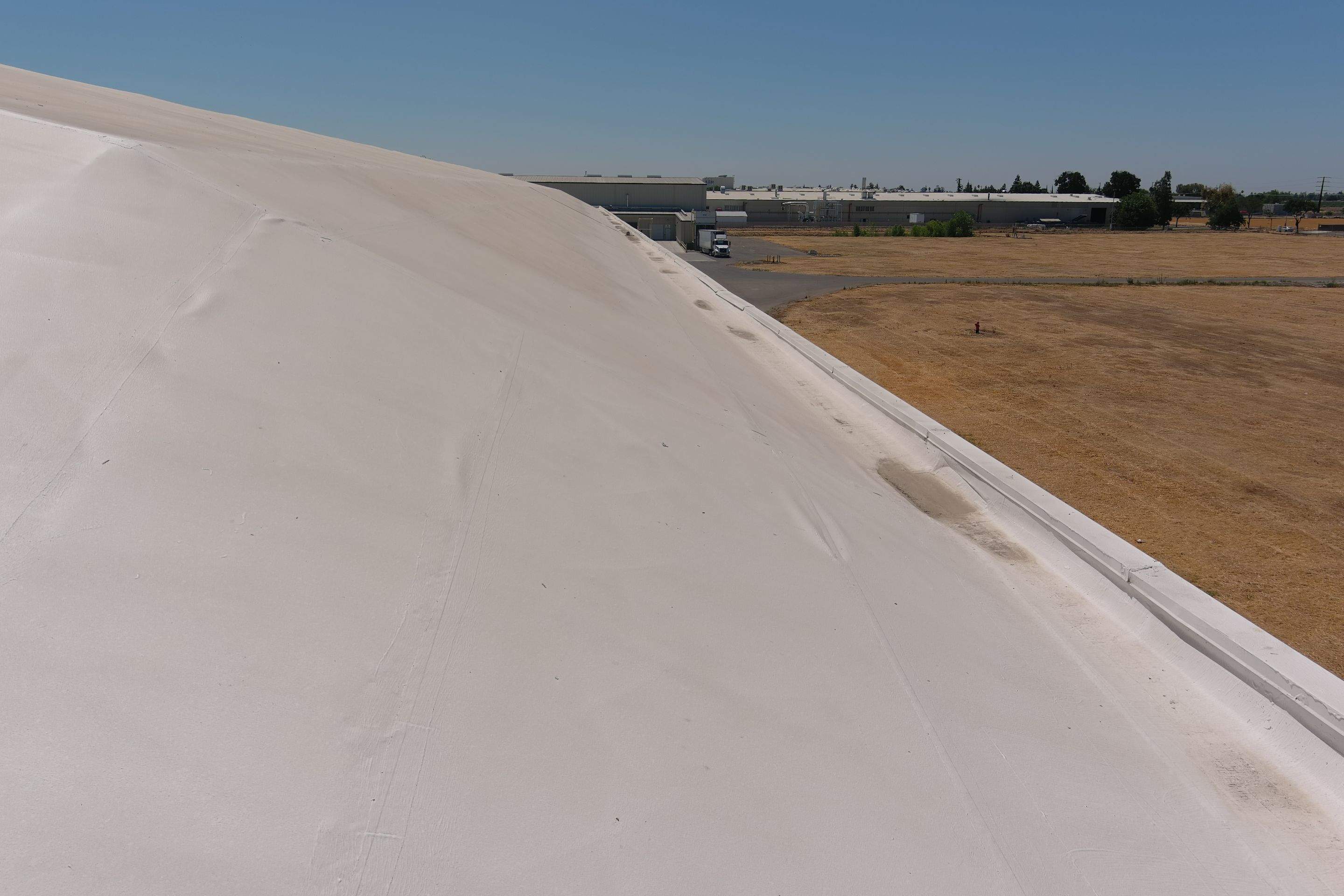 Single-ply restoration system using Conklin Benchmark/PUMA XL fabric and coating by Straight Edge Roofing Inc