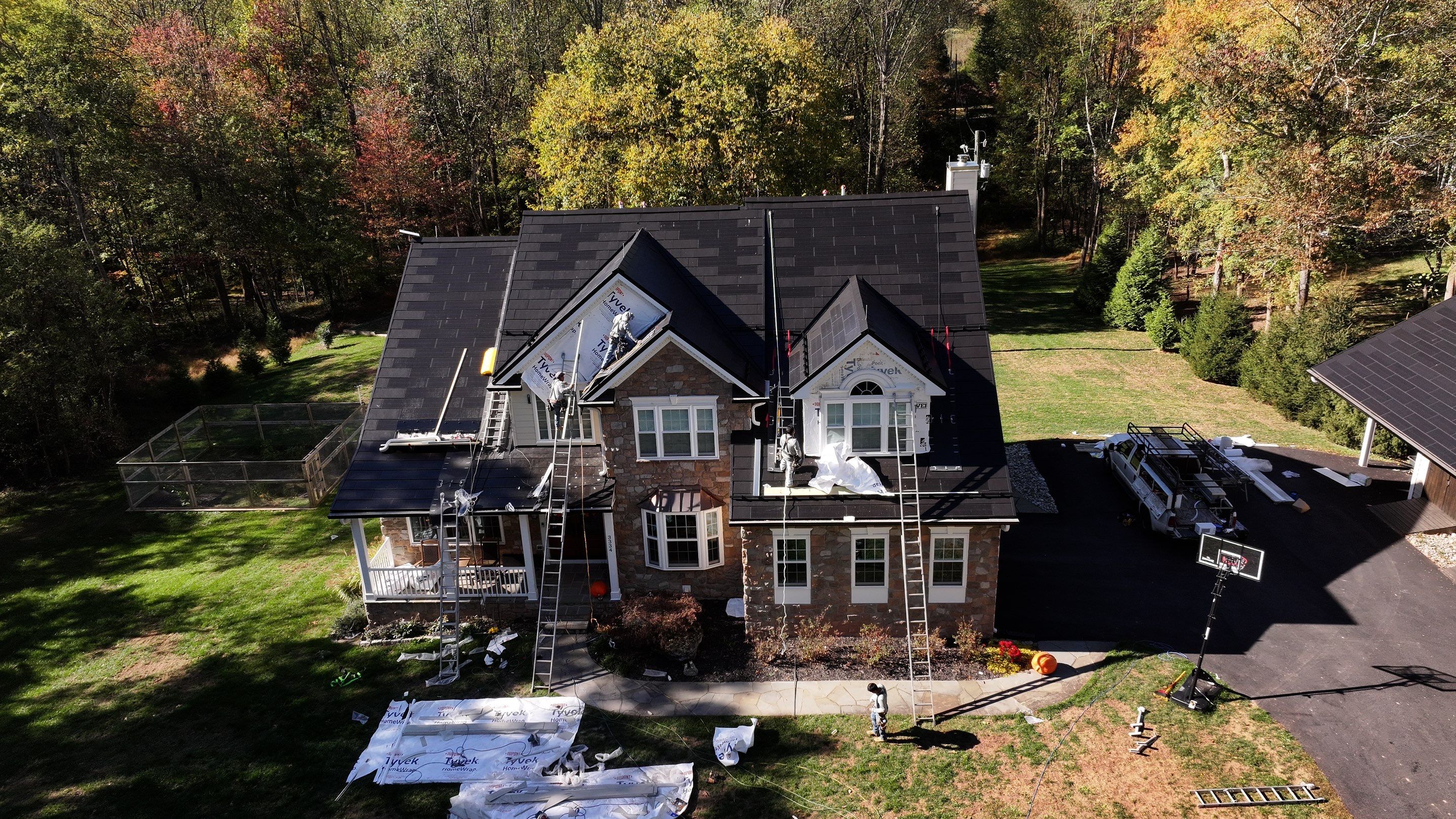 Beautiful James Hardie Siding & Tesla Solar Roof by American Home Contractors