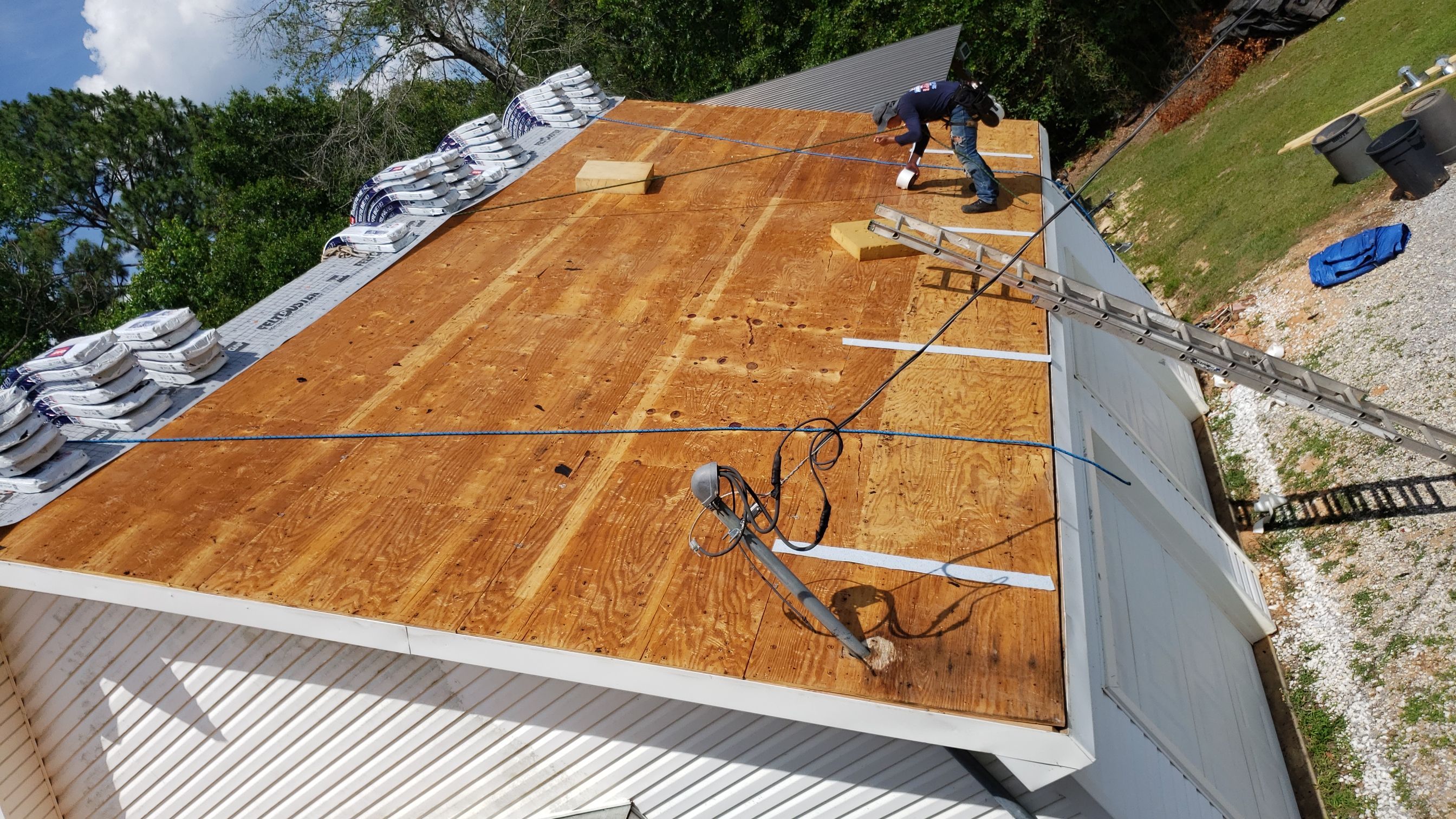 Residential Roofing Installation using Roof Replacement by American Roofing & Construction LLC