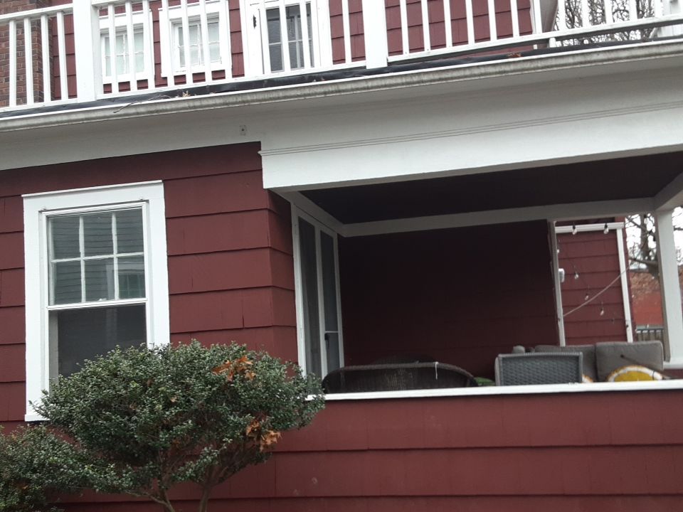 Residential Roof Replacement using Patio Roof by Absolute Roofing and Construction