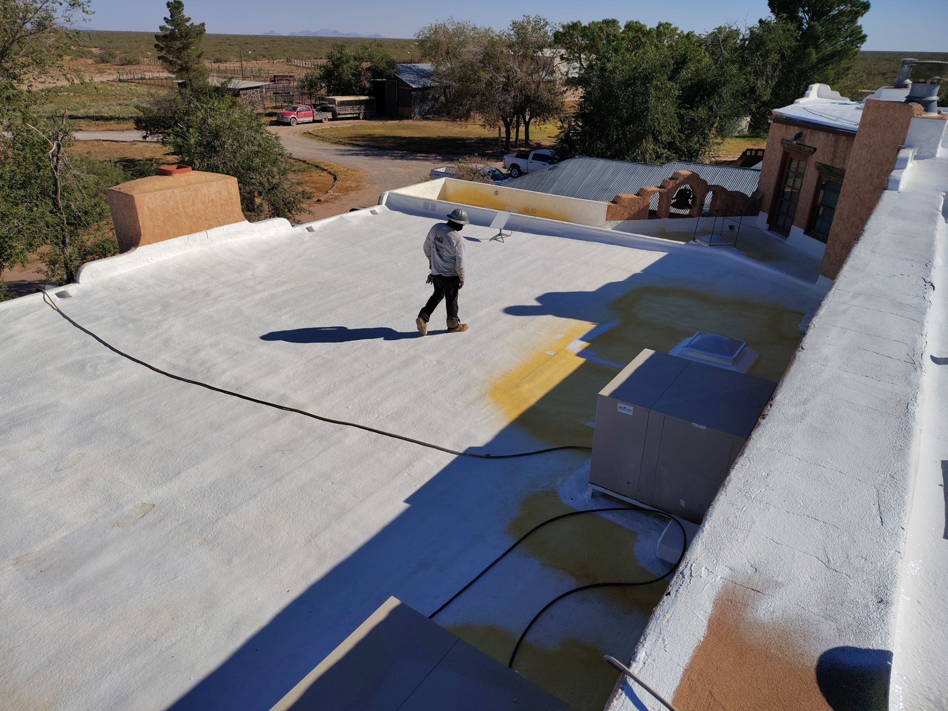Residential roof application by SPF Services 