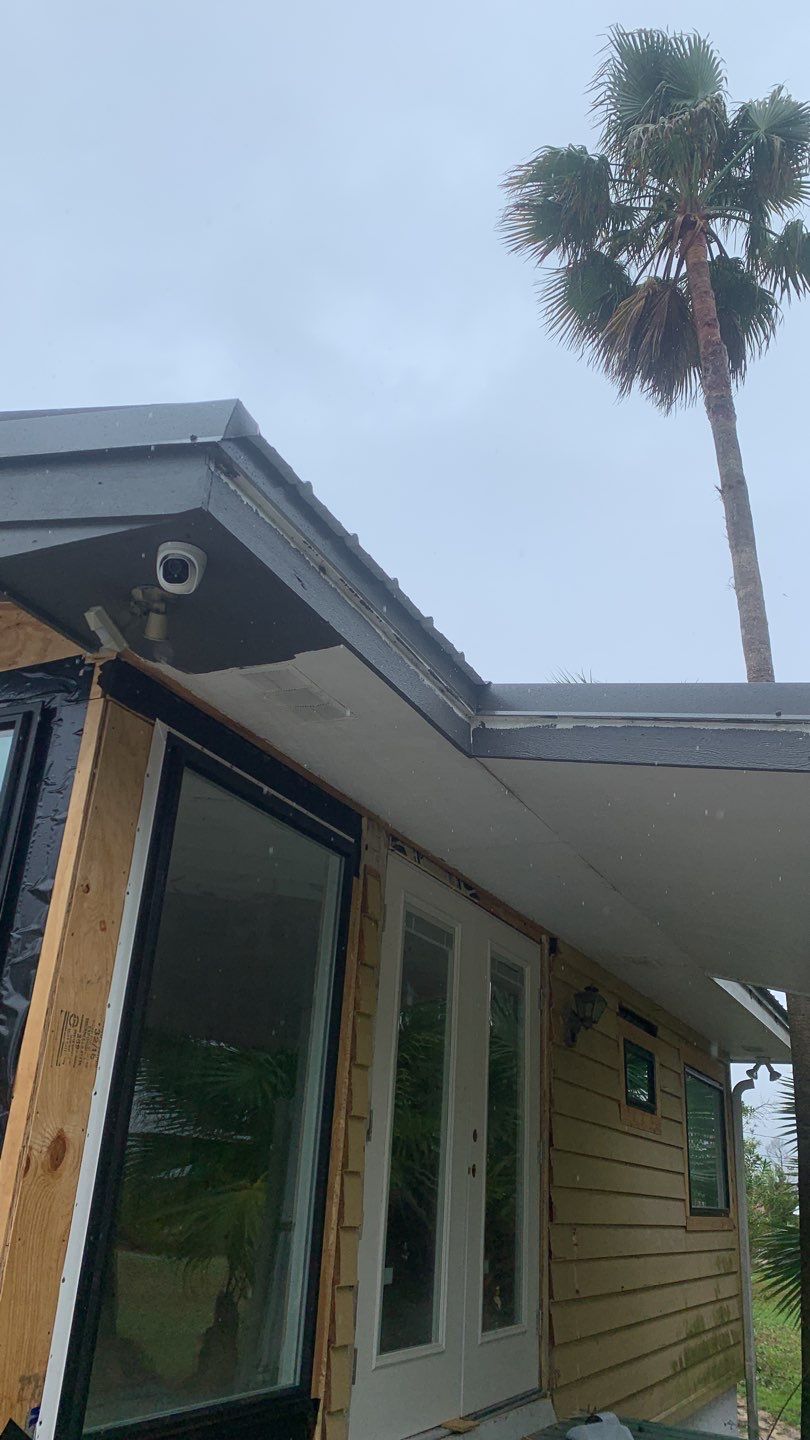 Seamless Gutter Installation using Charcoal Grey Gutters by Gutter Professors