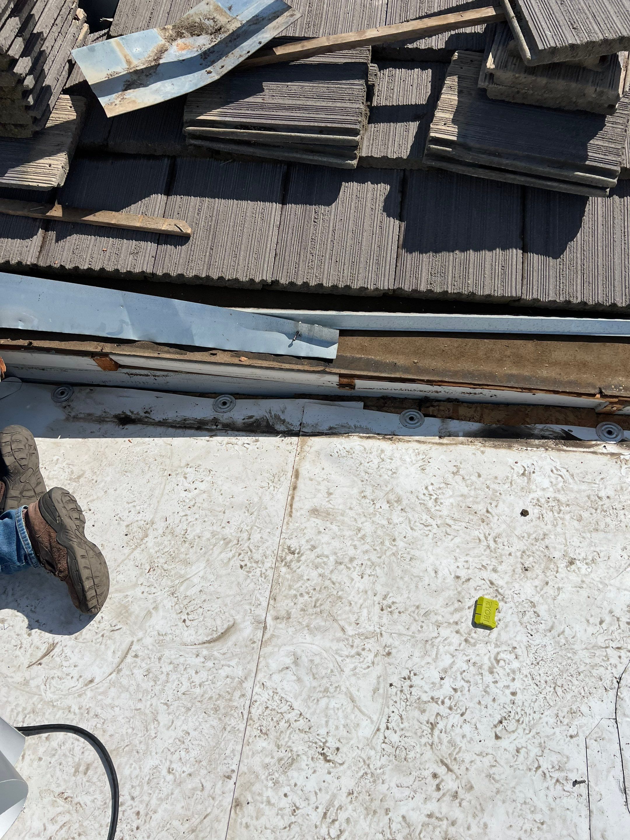 Single-ply roofing system on porch using TPO 60 mil by Straight Edge Roofing Inc