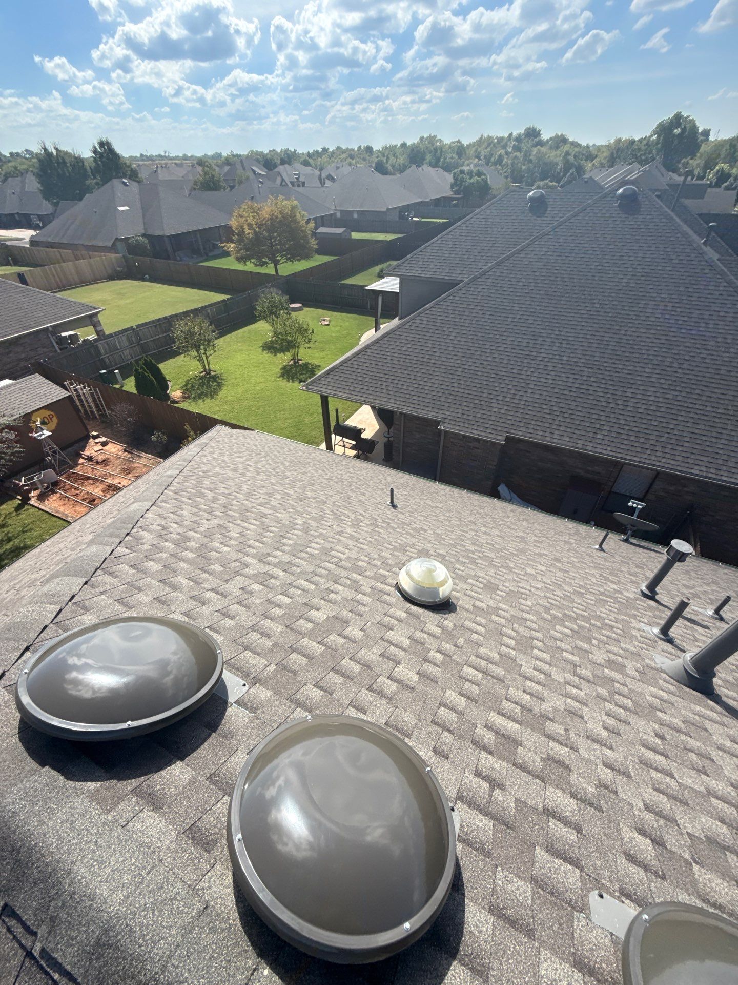 roof replacement in Moore by McCann's Roofing and Construction