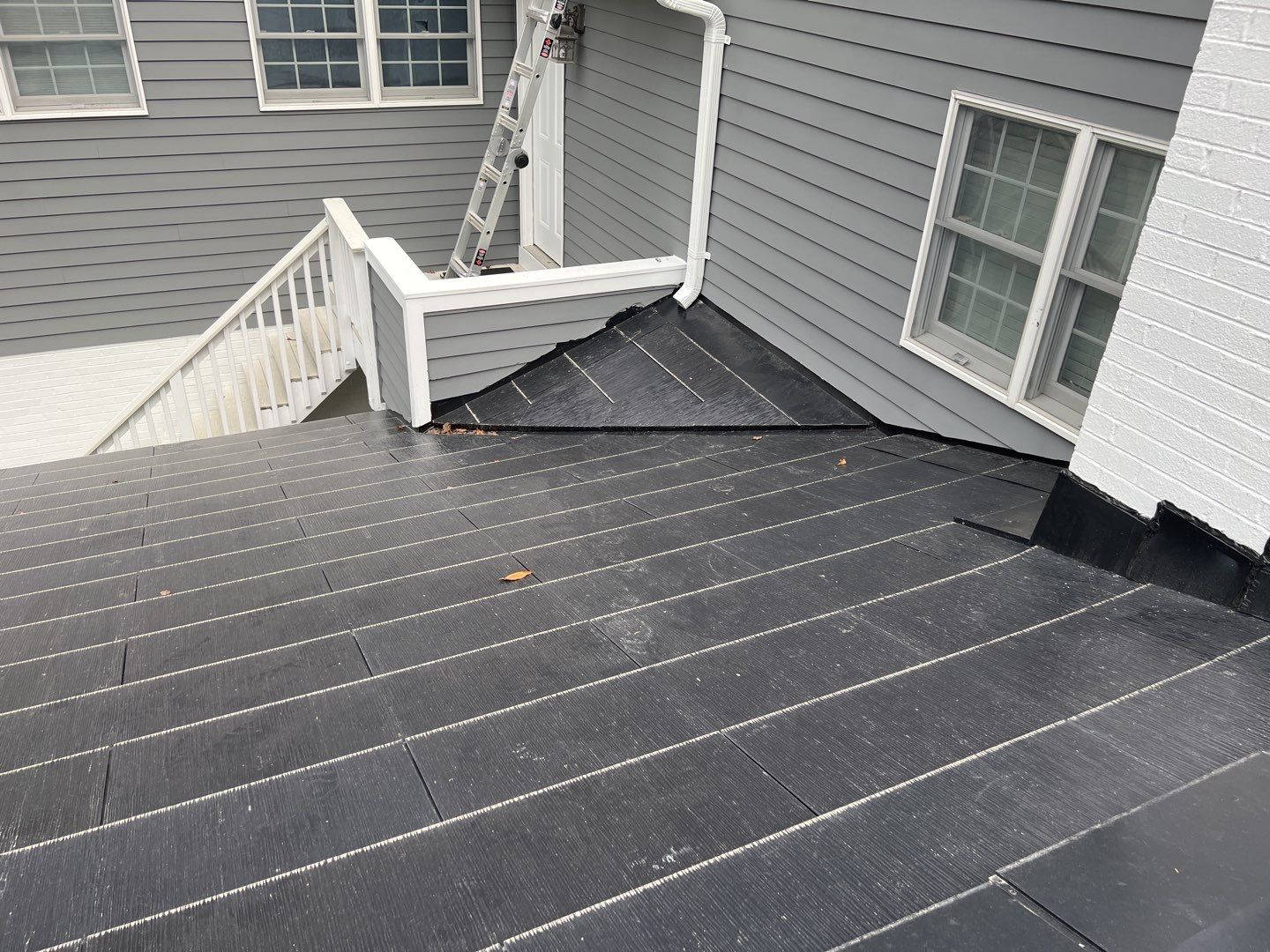 Tesla Solar Roof Replacement using Tesla Solar Roof V3 Tiles by American Home Contractors