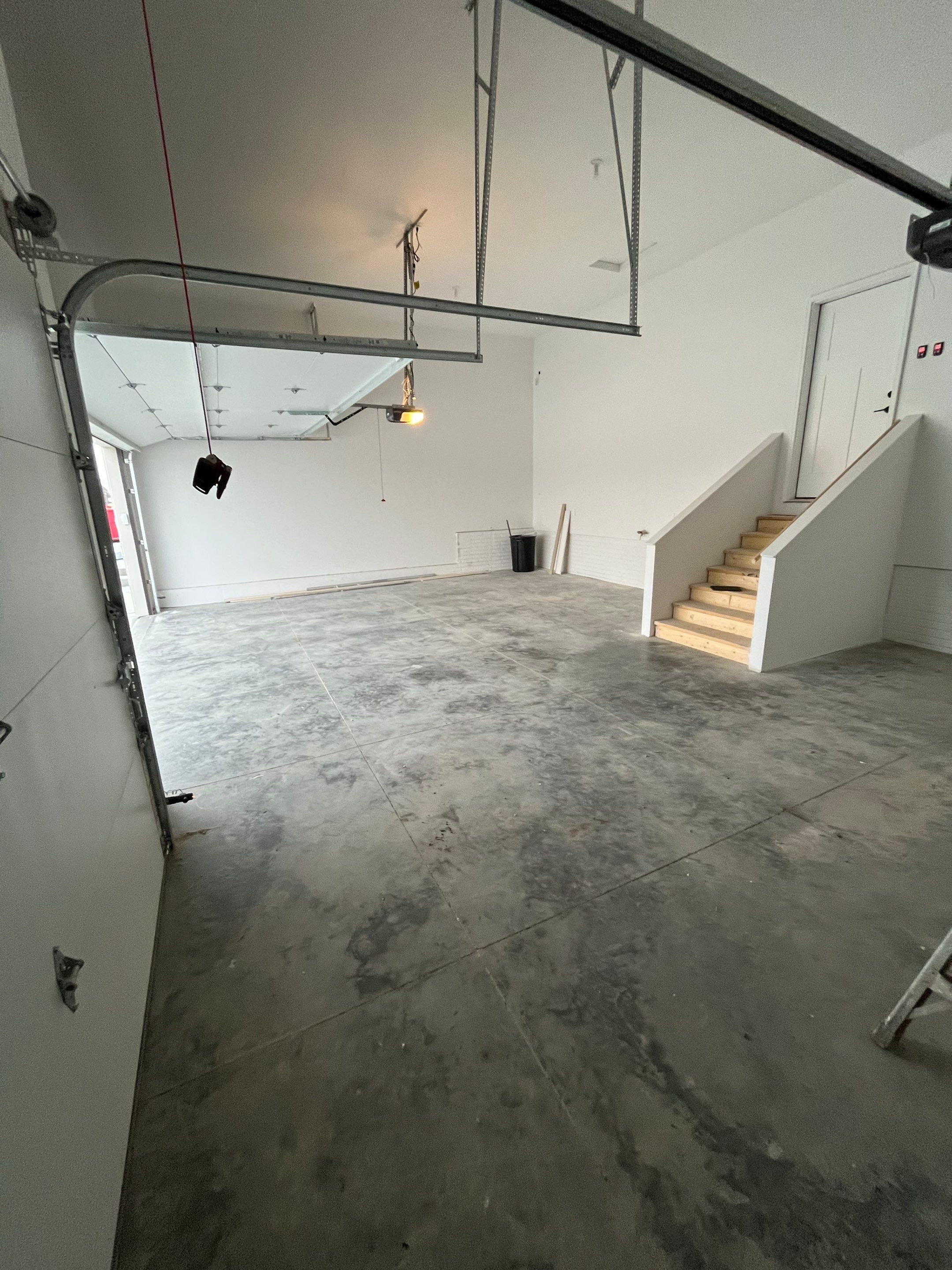 Garage using Sandstone by Select Painting, Coatings & Garage Cabinets