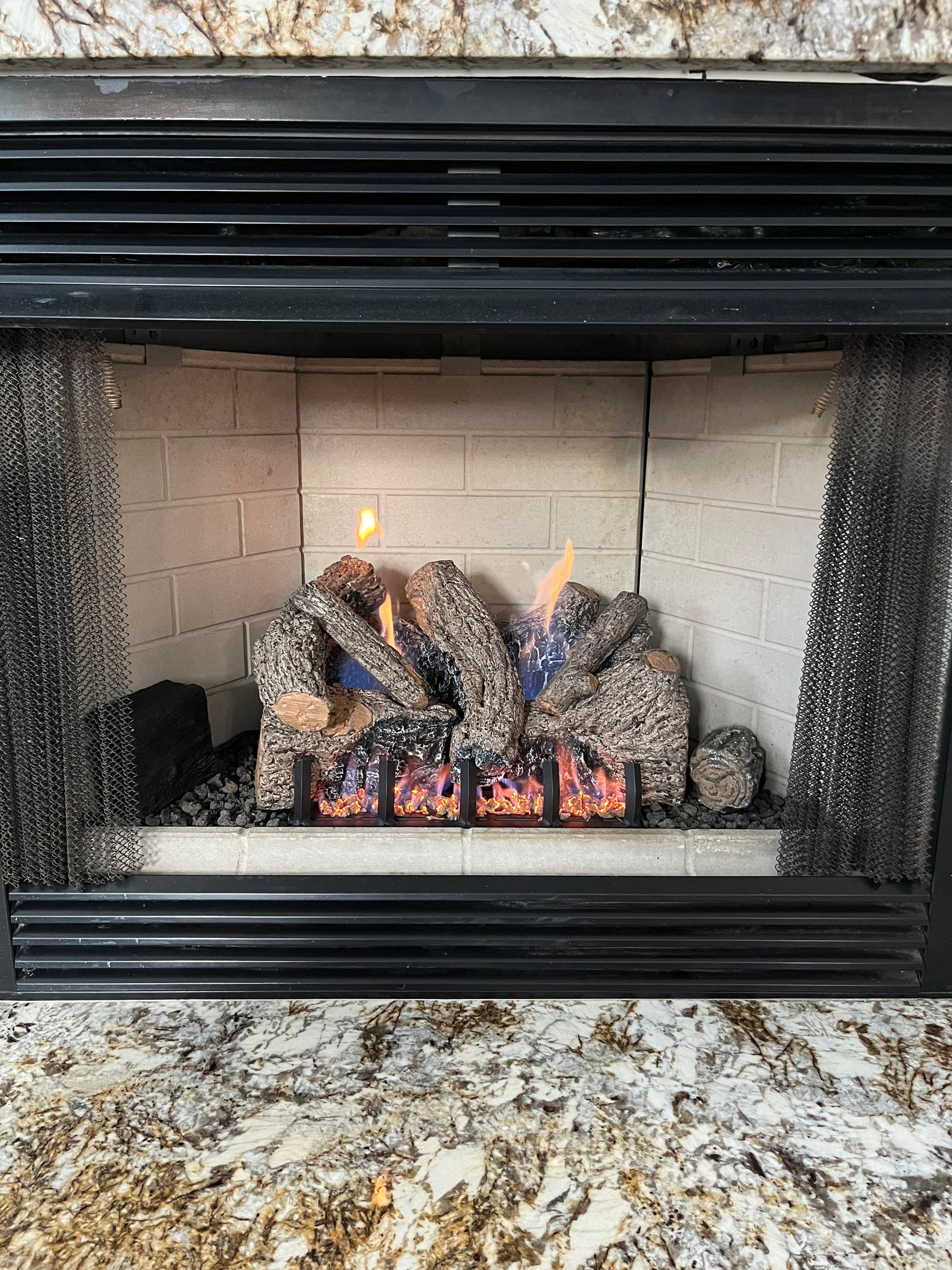 Gas Log Installation in Hampton by Premier Chimney and Roofing