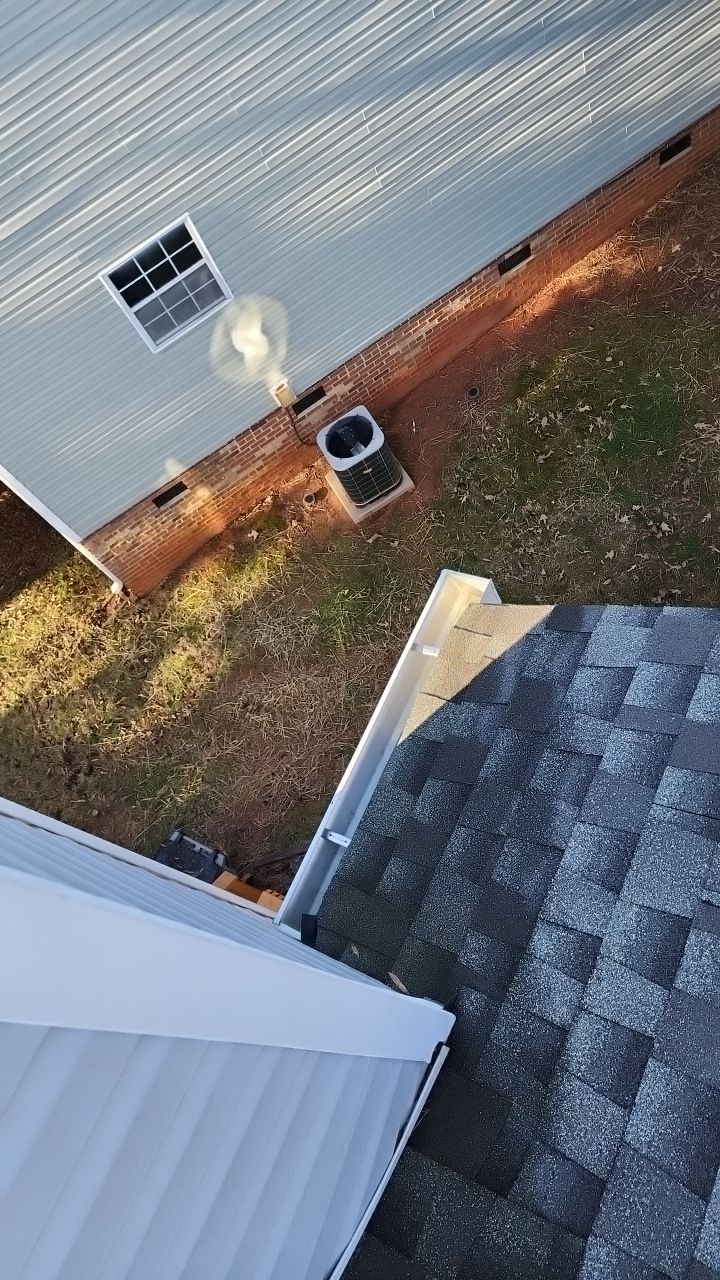Gutter Cleaning using water by Power Wash Masters LLC