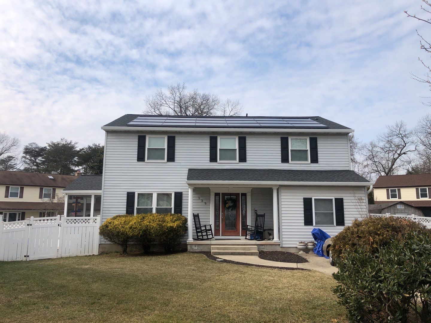 Roof Replacement with GAF Decotech integrated solar panels by American Home Contractors