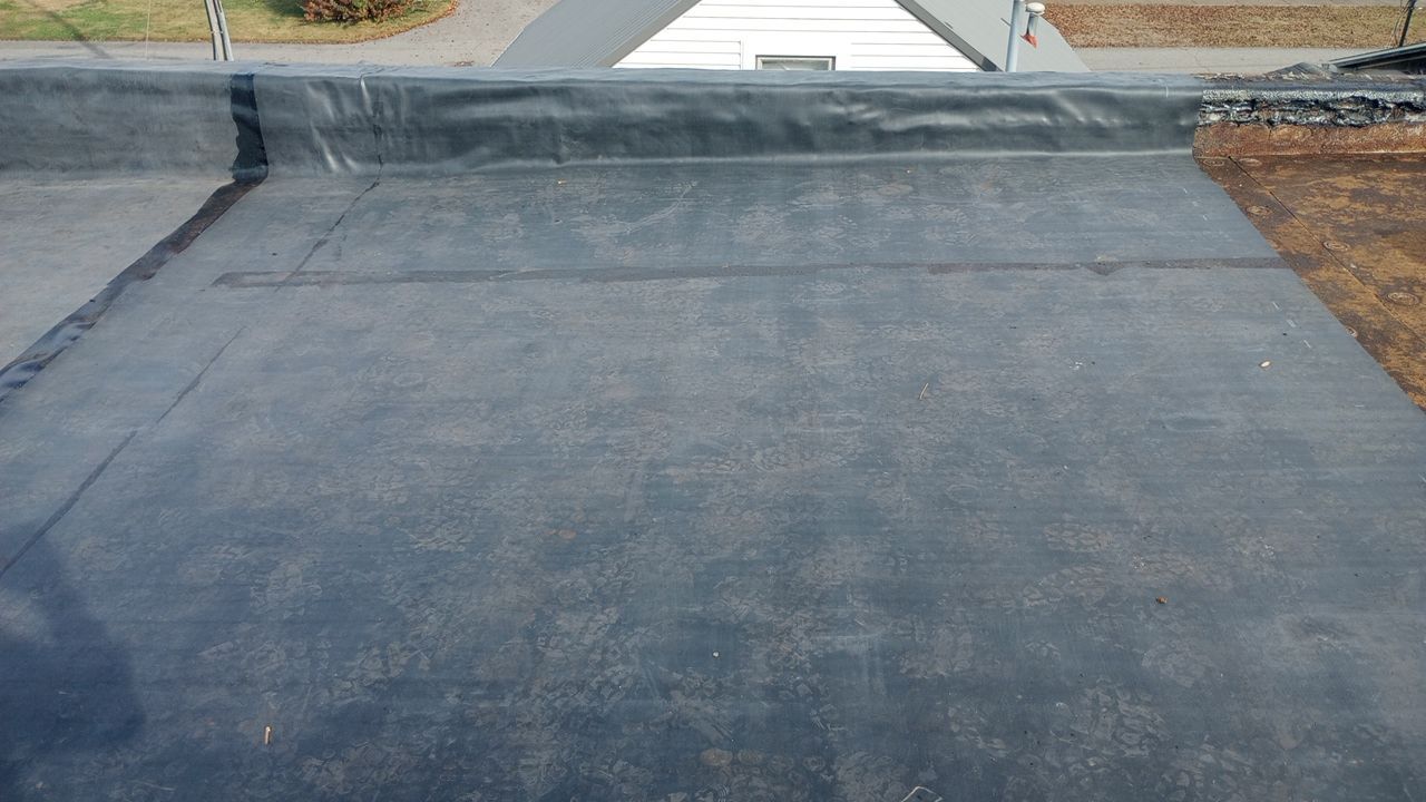 Commercial Roofing Installation using Performance Shingles by Mr. Roofer