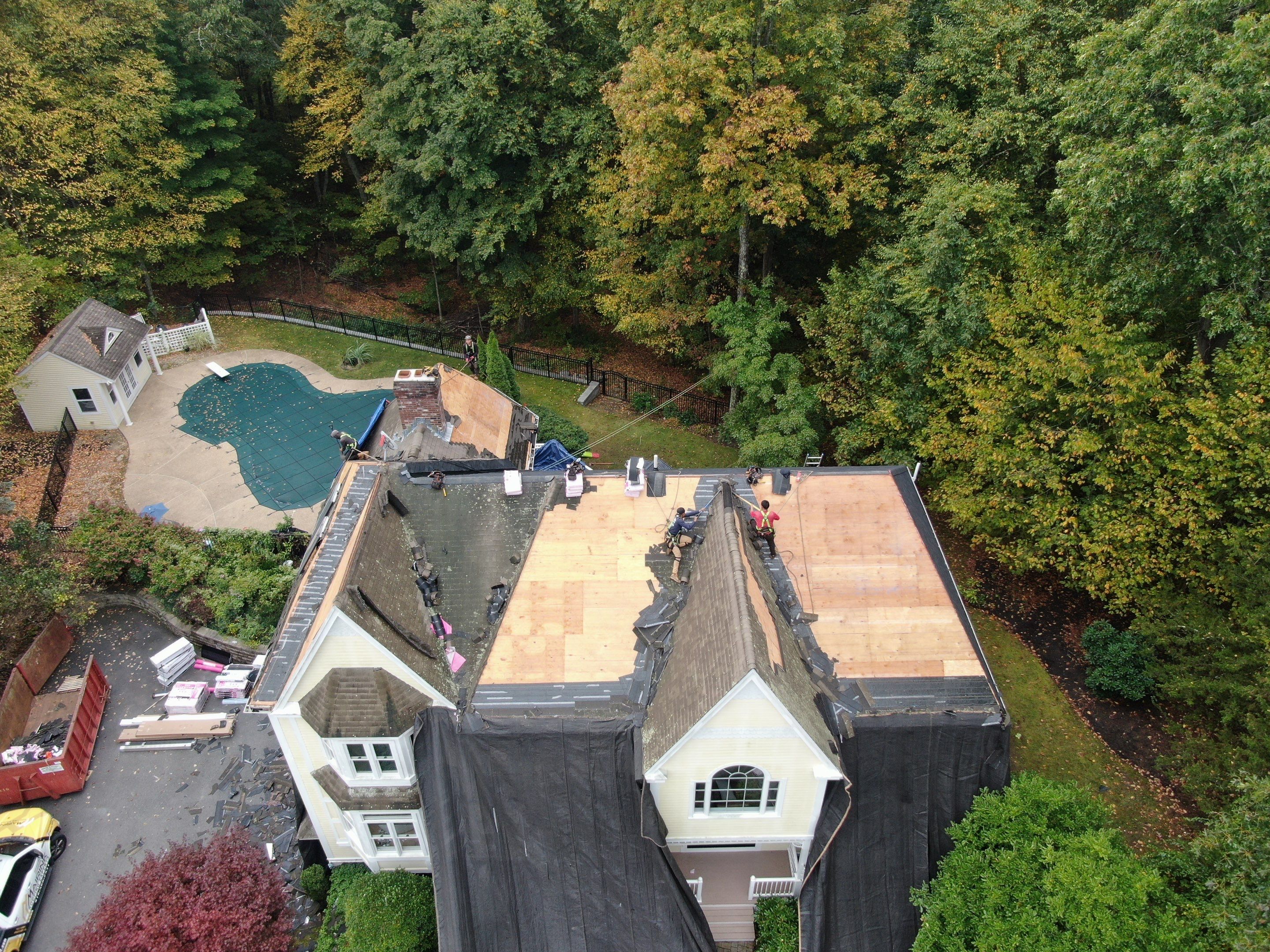 New Roof, Skylights, and Metal Accent Roof Installation in Groton by Mighty Dog Roofing of Greater Middlesex County
