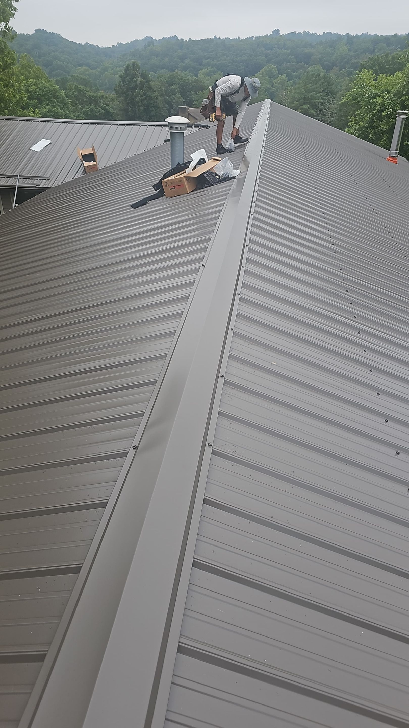 Residential Roofing Installation using Metal by Rainstoppers Roofing