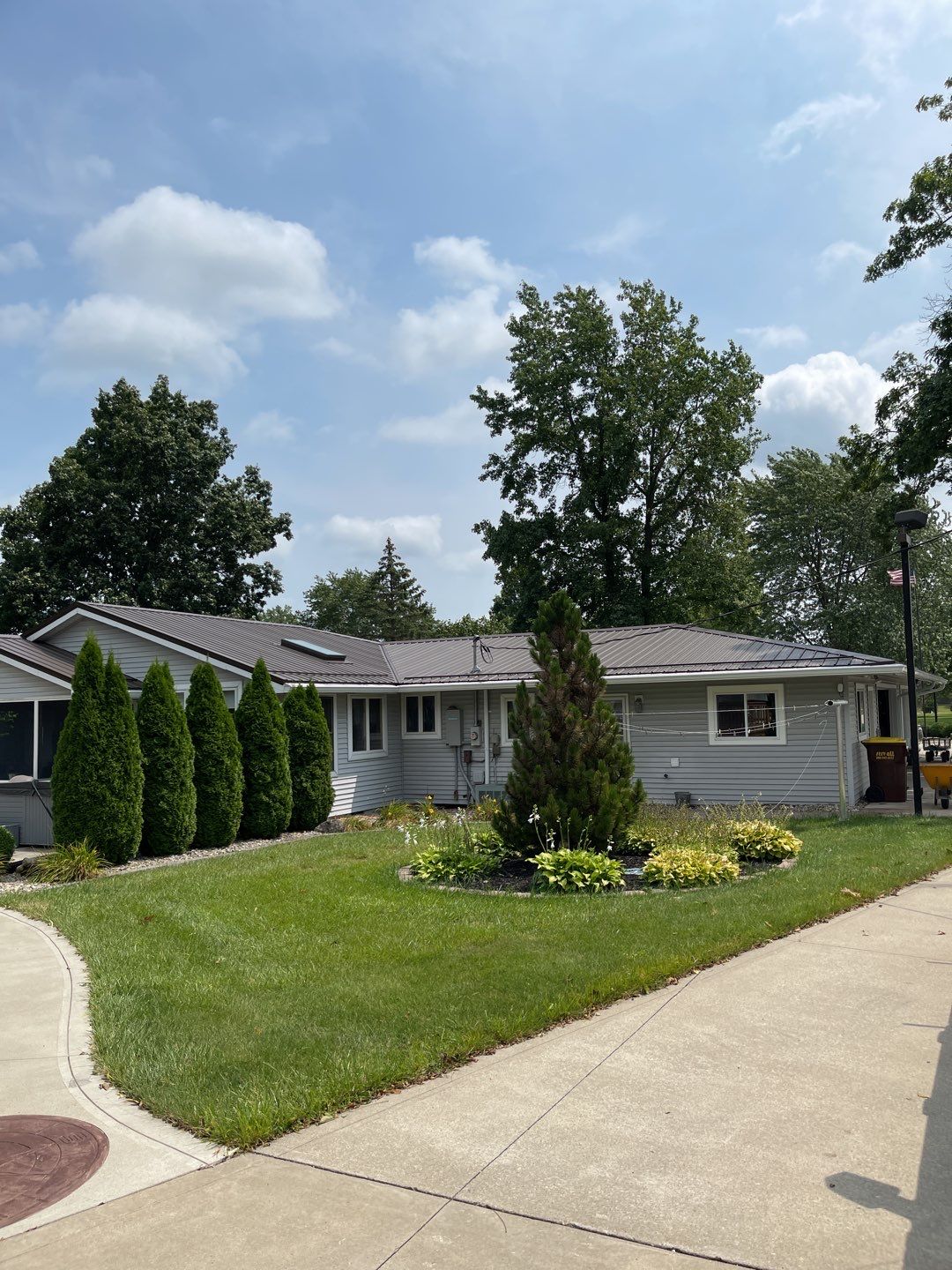 Residential Roofing Installation using Exposed Fastener Metal Roof by 4Ever Metal Roofing