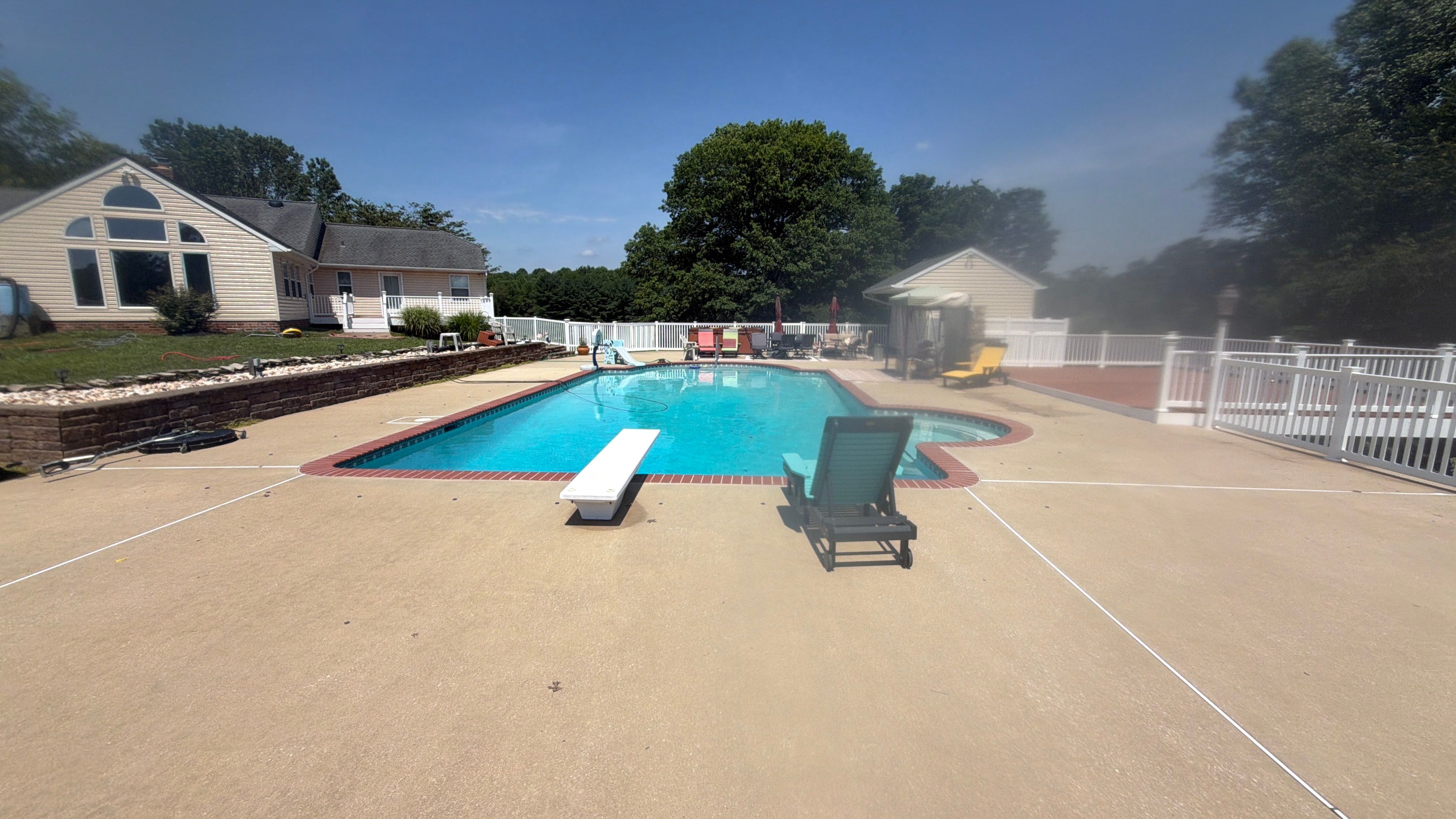 Concrete Pool Deck and Multi-Bay Building Cleaning in Eldersburg by Baltimore Pressure Washers Inc.